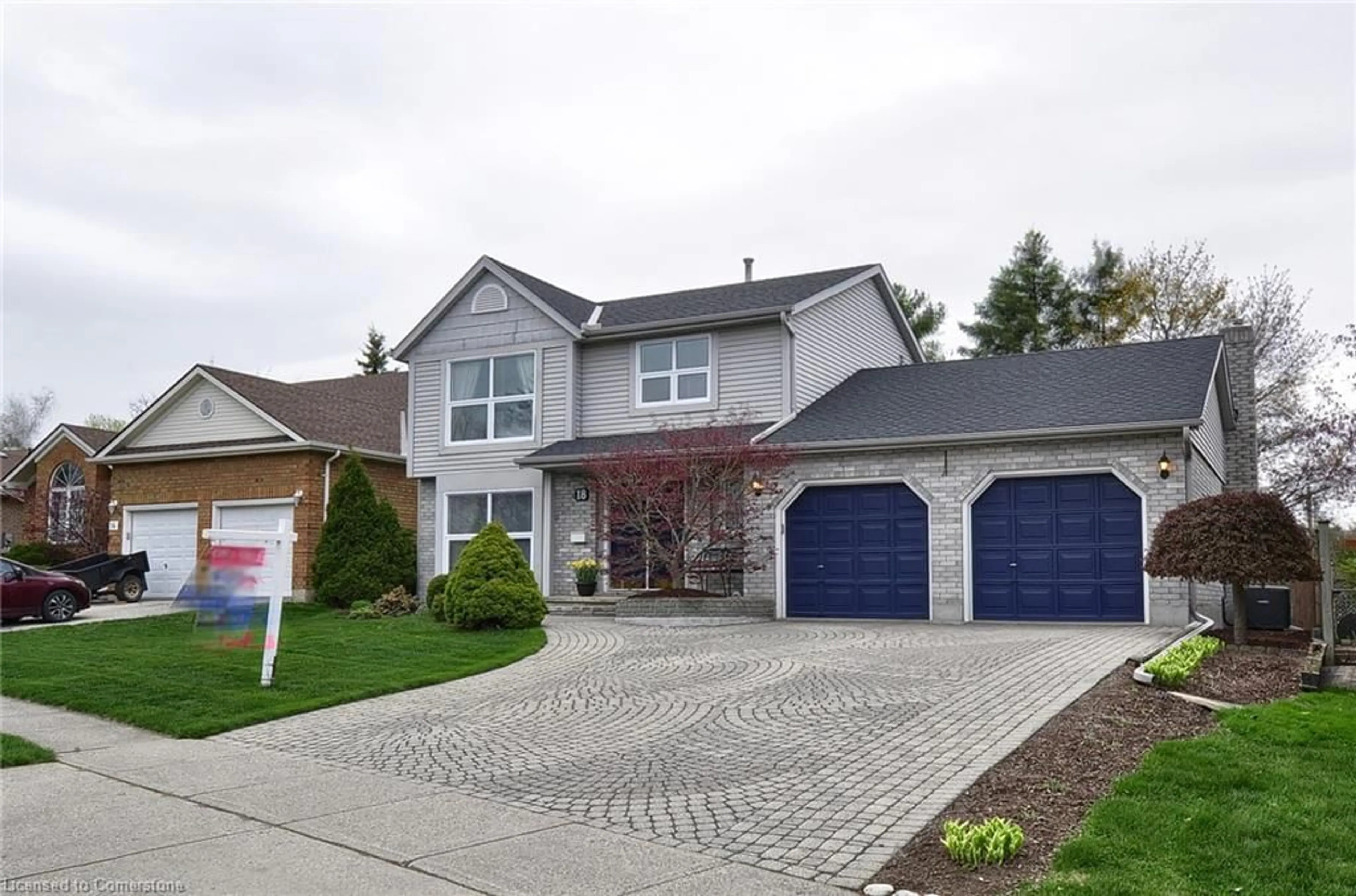 Home with vinyl exterior material, street for 18 Devil`s Creek Dr, Cambridge Ontario N1S 2Y2