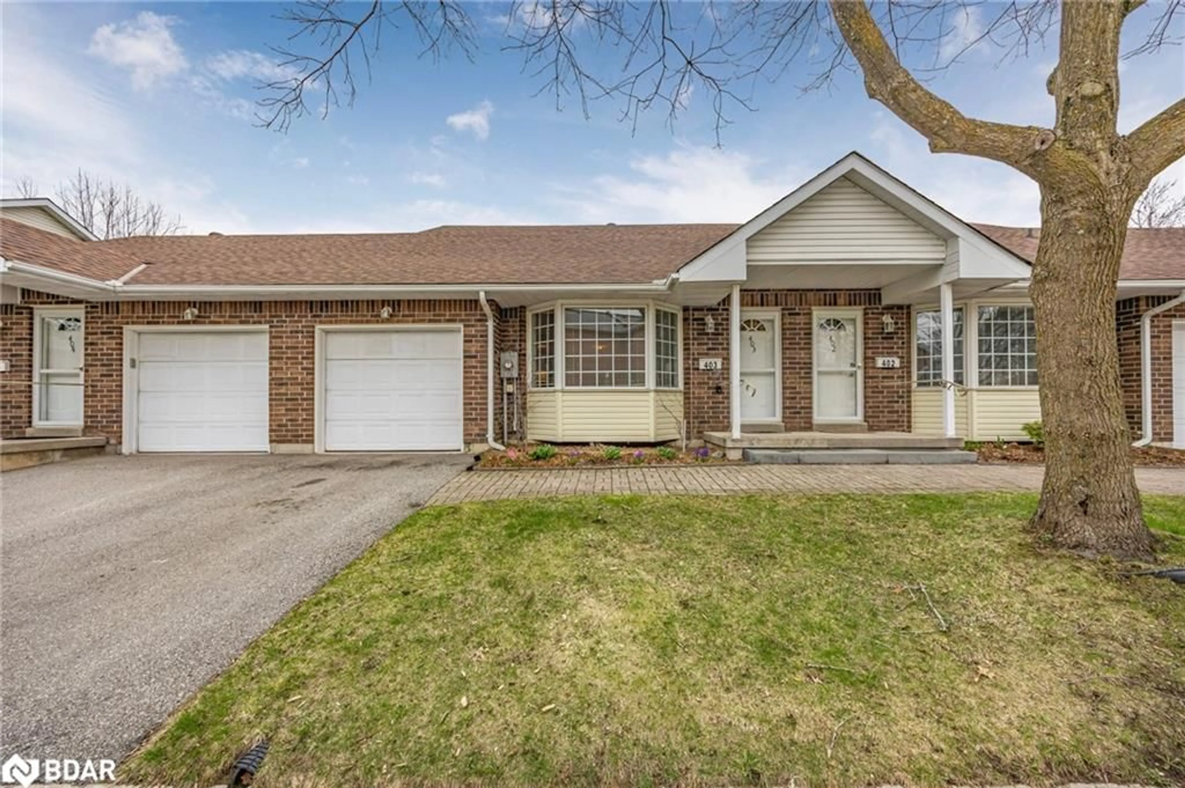 Home with brick exterior material, street for 40 Museum Dr #403, Orillia Ontario L3V 7T9