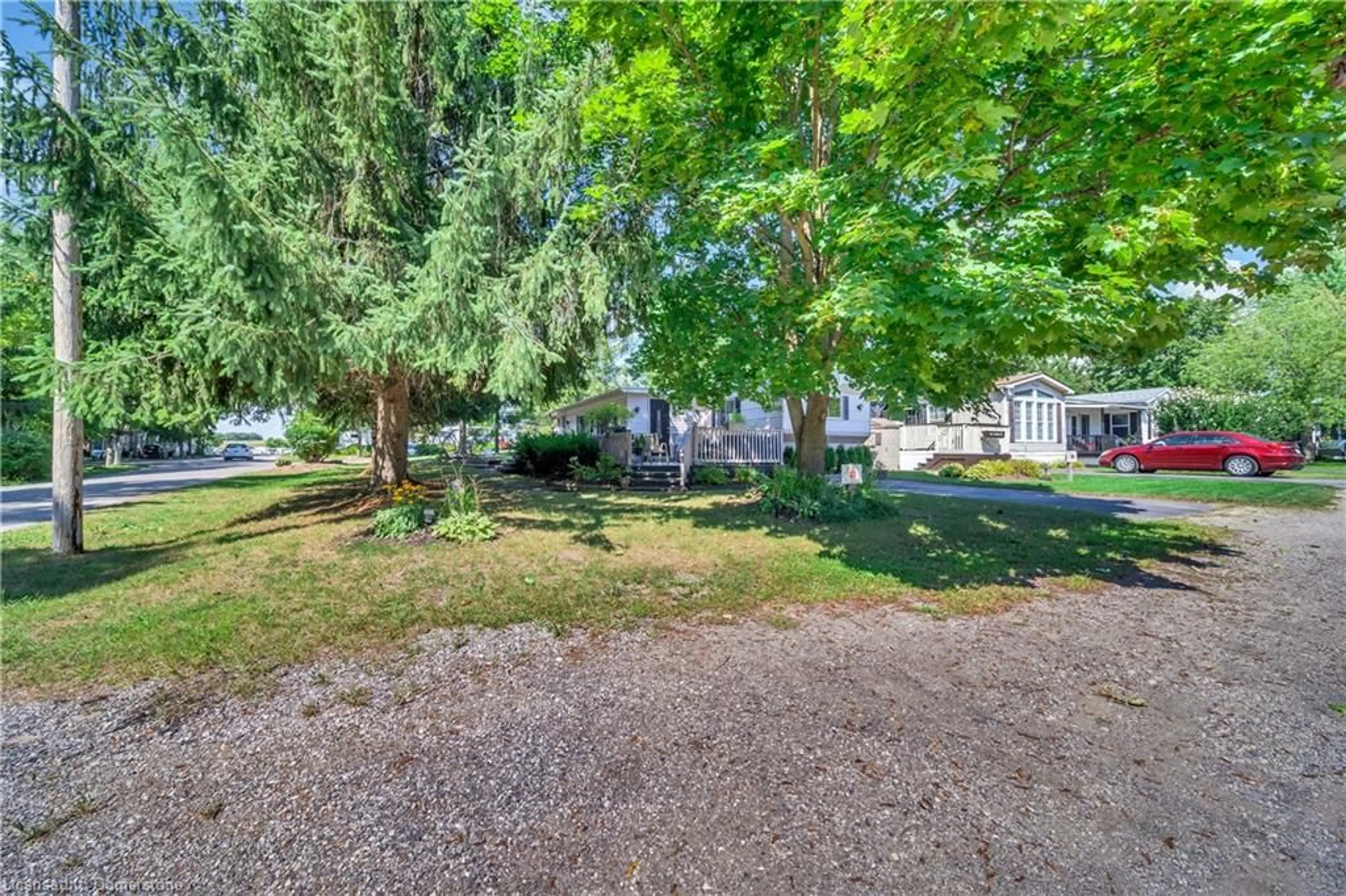 A pic from outside/outdoor area/front of a property/back of a property/a pic from drone, street for 580 Beaver Creek Rd #21, Waterloo Ontario N2J 3Z4