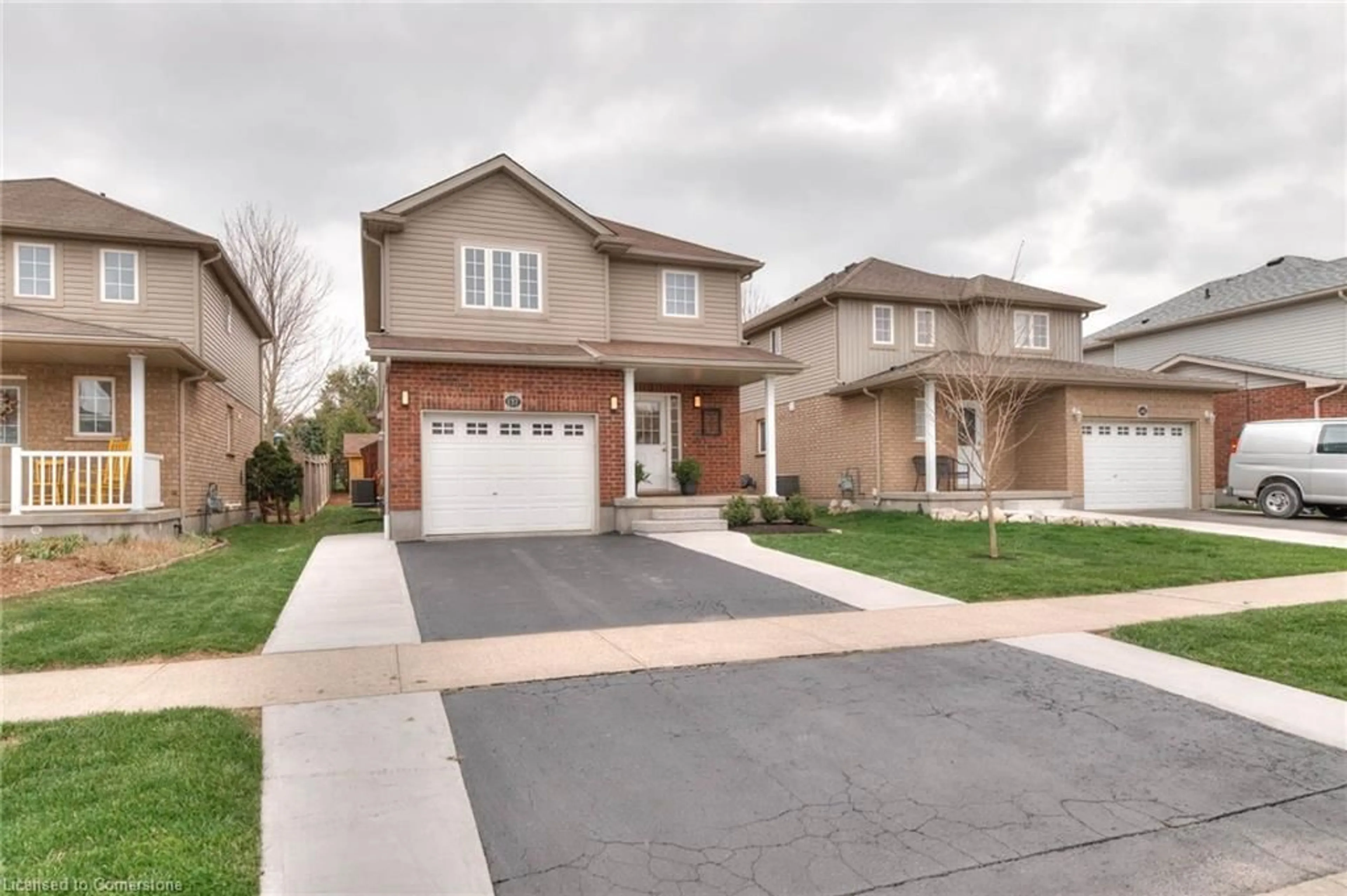 Home with brick exterior material, street for 137 Porchlight Dr, Elmira Ontario N3B 0A3