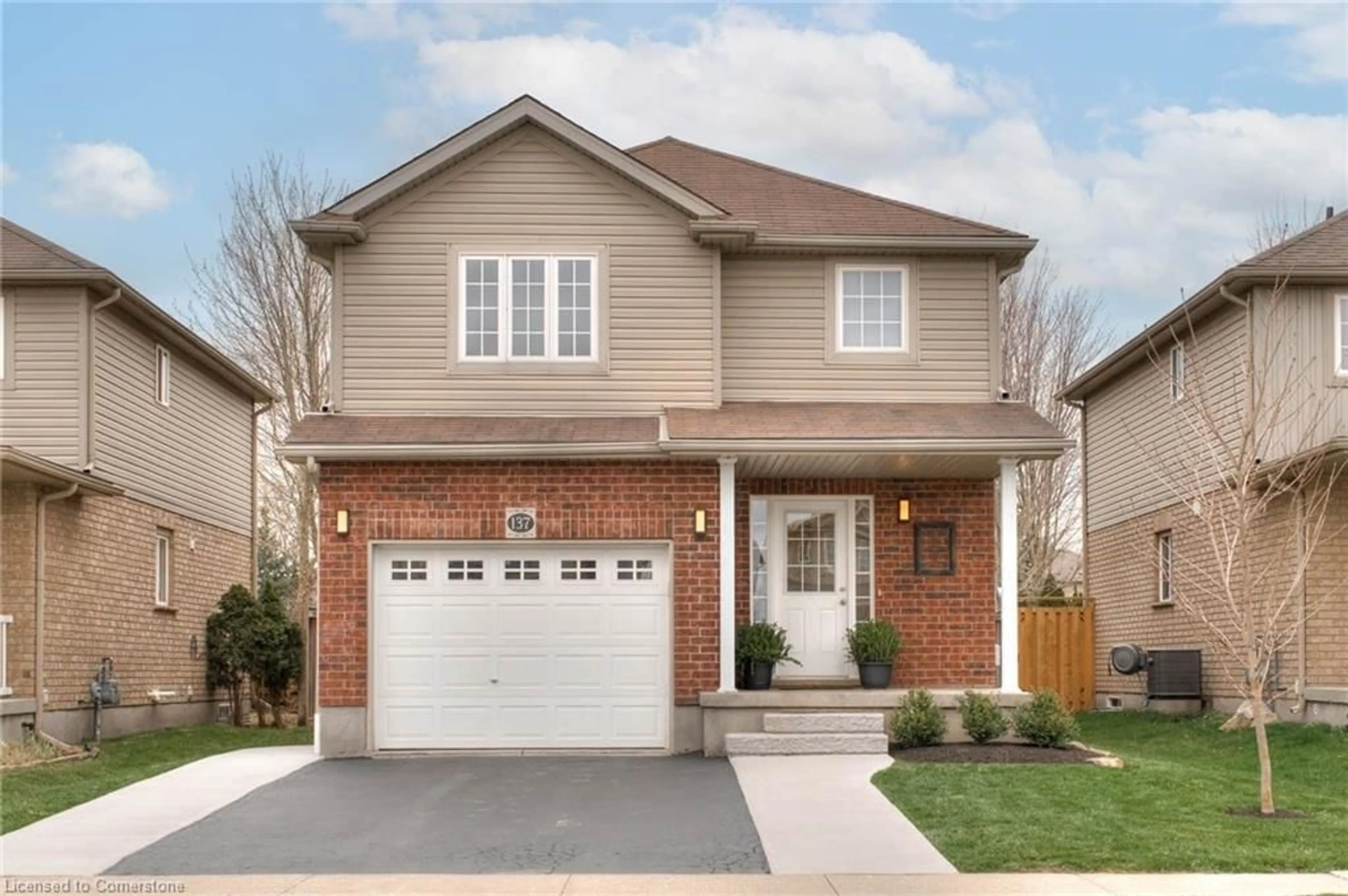 Home with brick exterior material, street for 137 Porchlight Dr, Elmira Ontario N3B 0A3