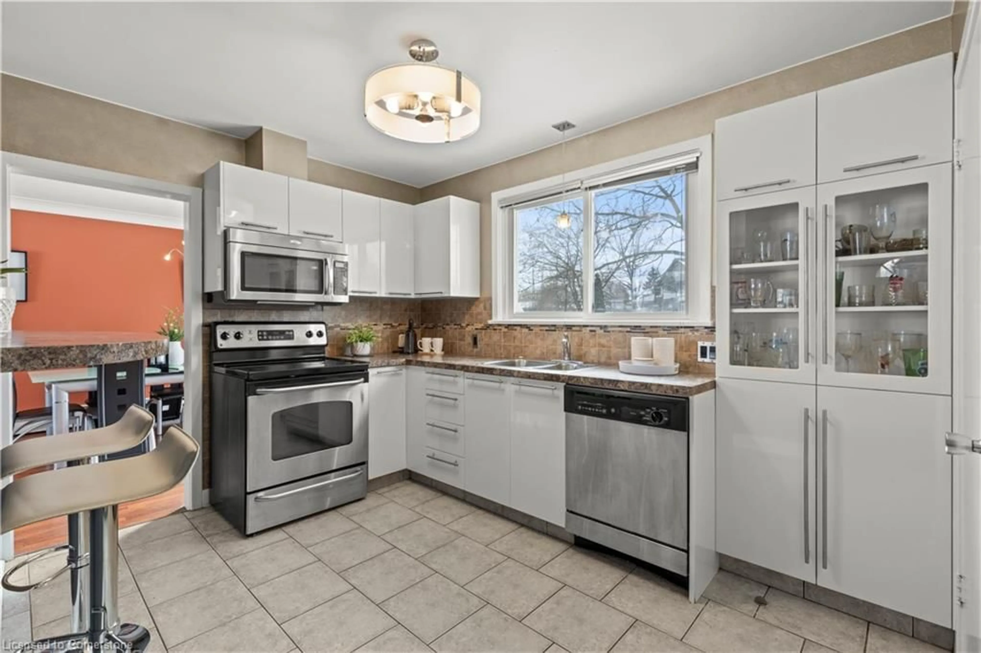 Open concept kitchen, ceramic/tile floor for 504 Carlton St, St. Catharines Ontario L2M 4X3