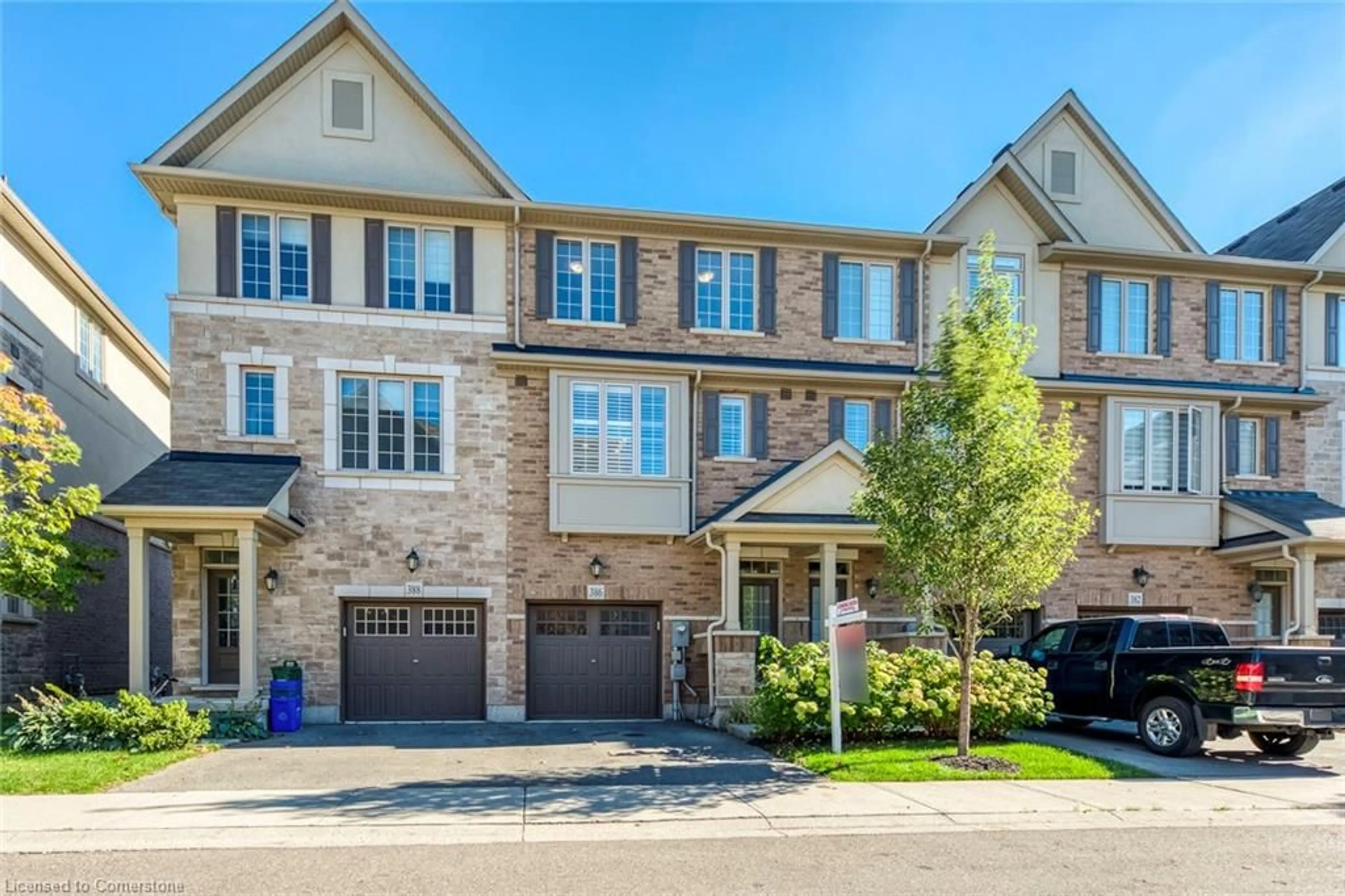 Home with brick exterior material, street for 386 Belcourt Common, Oakville Ontario L6H 0R1