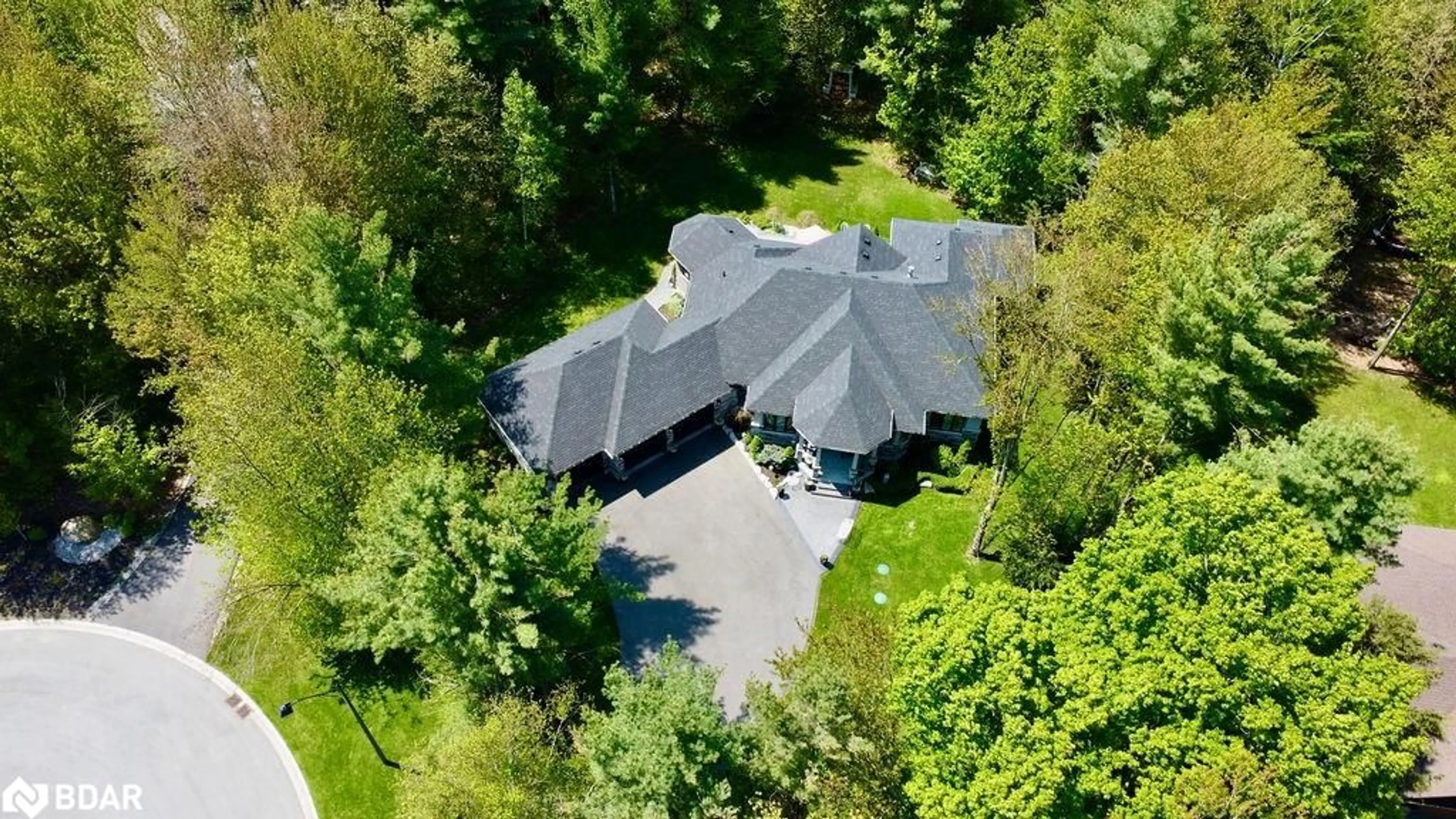 A pic from outside/outdoor area/front of a property/back of a property/a pic from drone, street for 2 Sycamore Cir, Springwater Ontario L0L 2K0