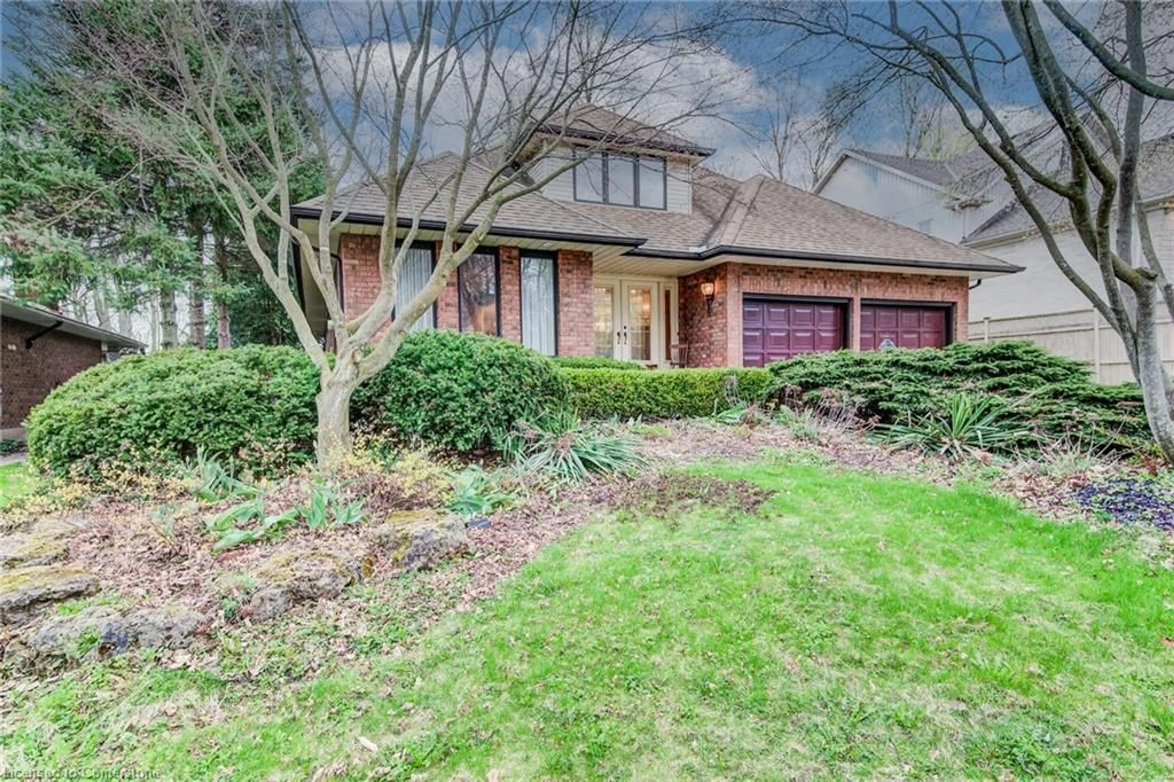 Home with brick exterior material, street for 225 Corrie Cres, Waterloo Ontario N2L 5W3