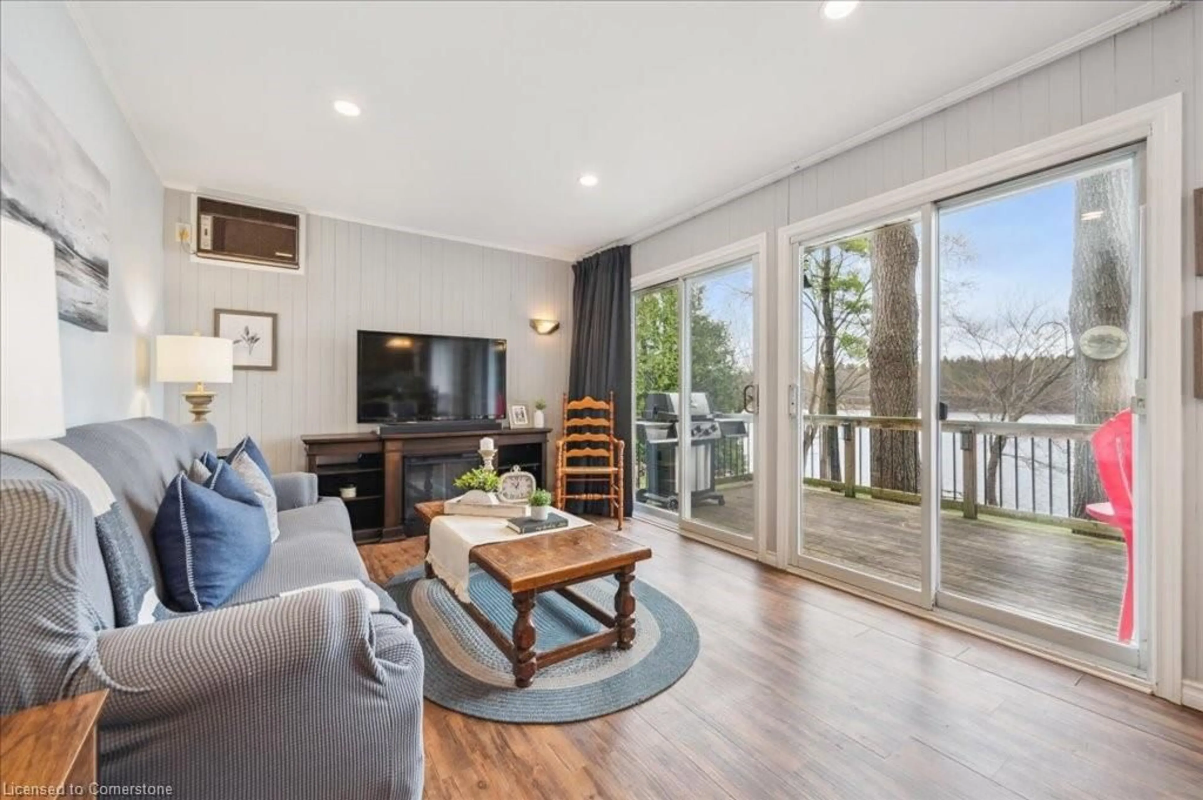 Living room with furniture, wood/laminate floor for 1012 Tenth N/S St, Belwood Ontario N0B 1J0