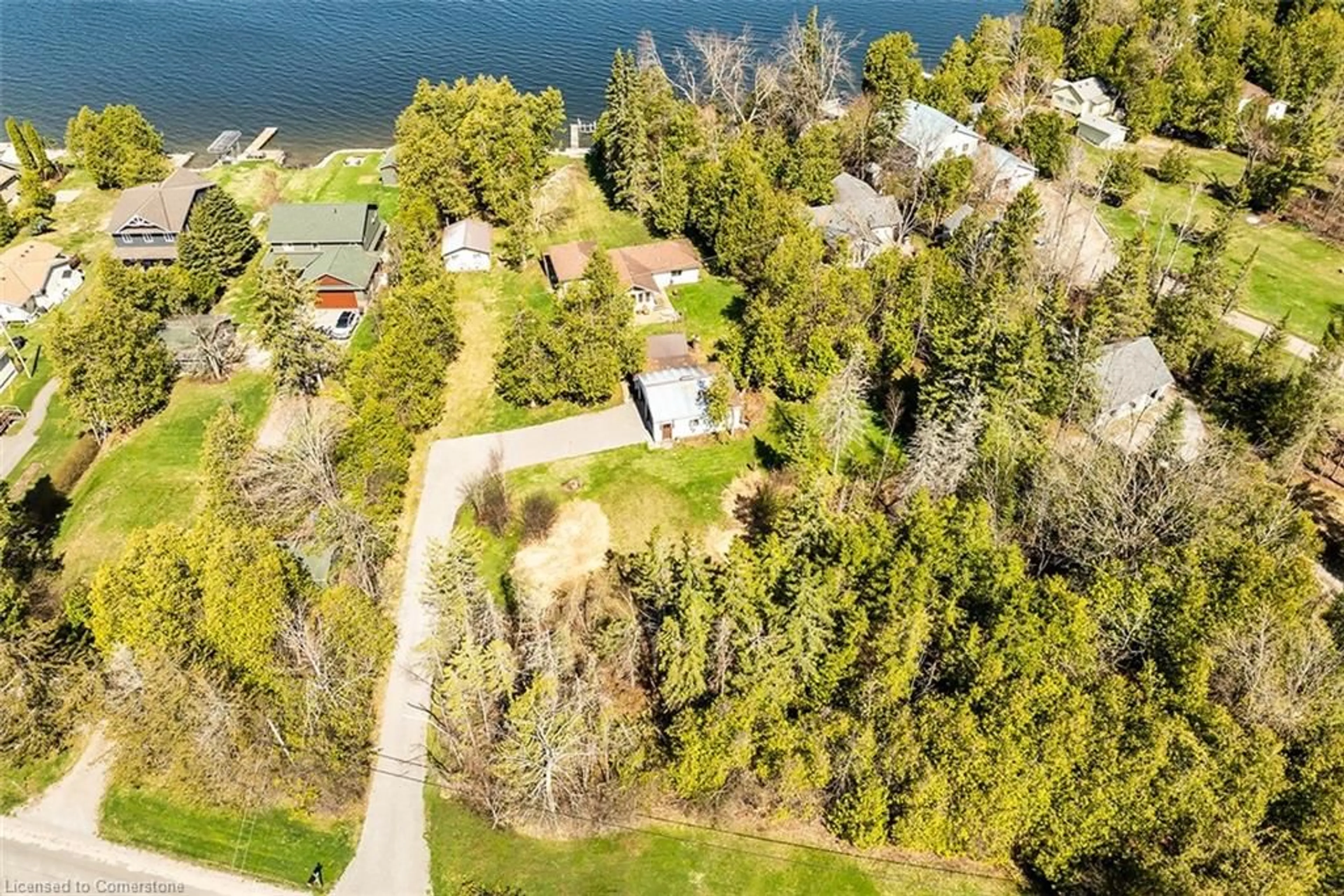 A pic from outside/outdoor area/front of a property/back of a property/a pic from drone, water/lake/river/ocean view for 12 Romany Ranch Rd, Cameron Ontario K0M 1G0
