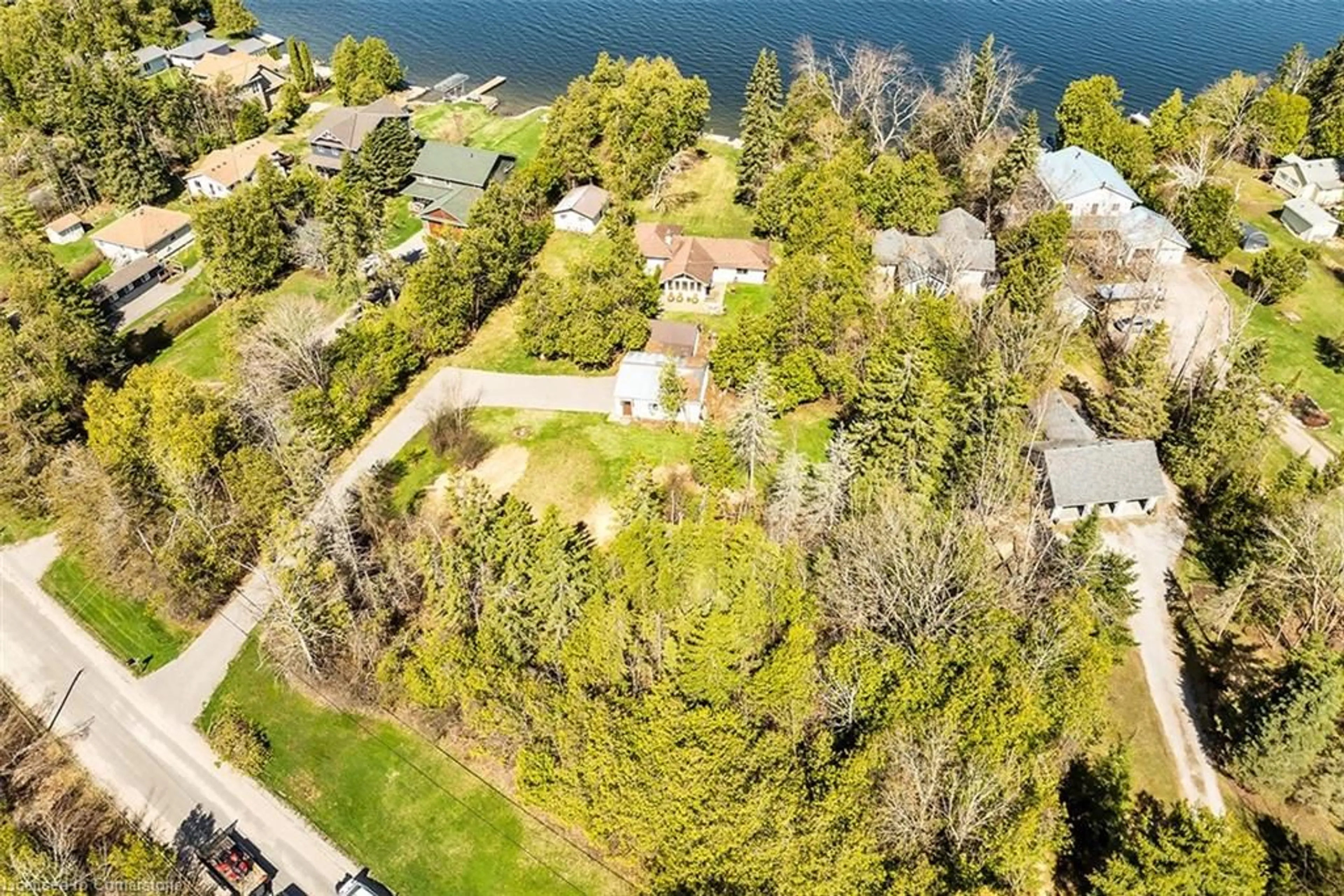 A pic from outside/outdoor area/front of a property/back of a property/a pic from drone, water/lake/river/ocean view for 12 Romany Ranch Rd, Cameron Ontario K0M 1G0