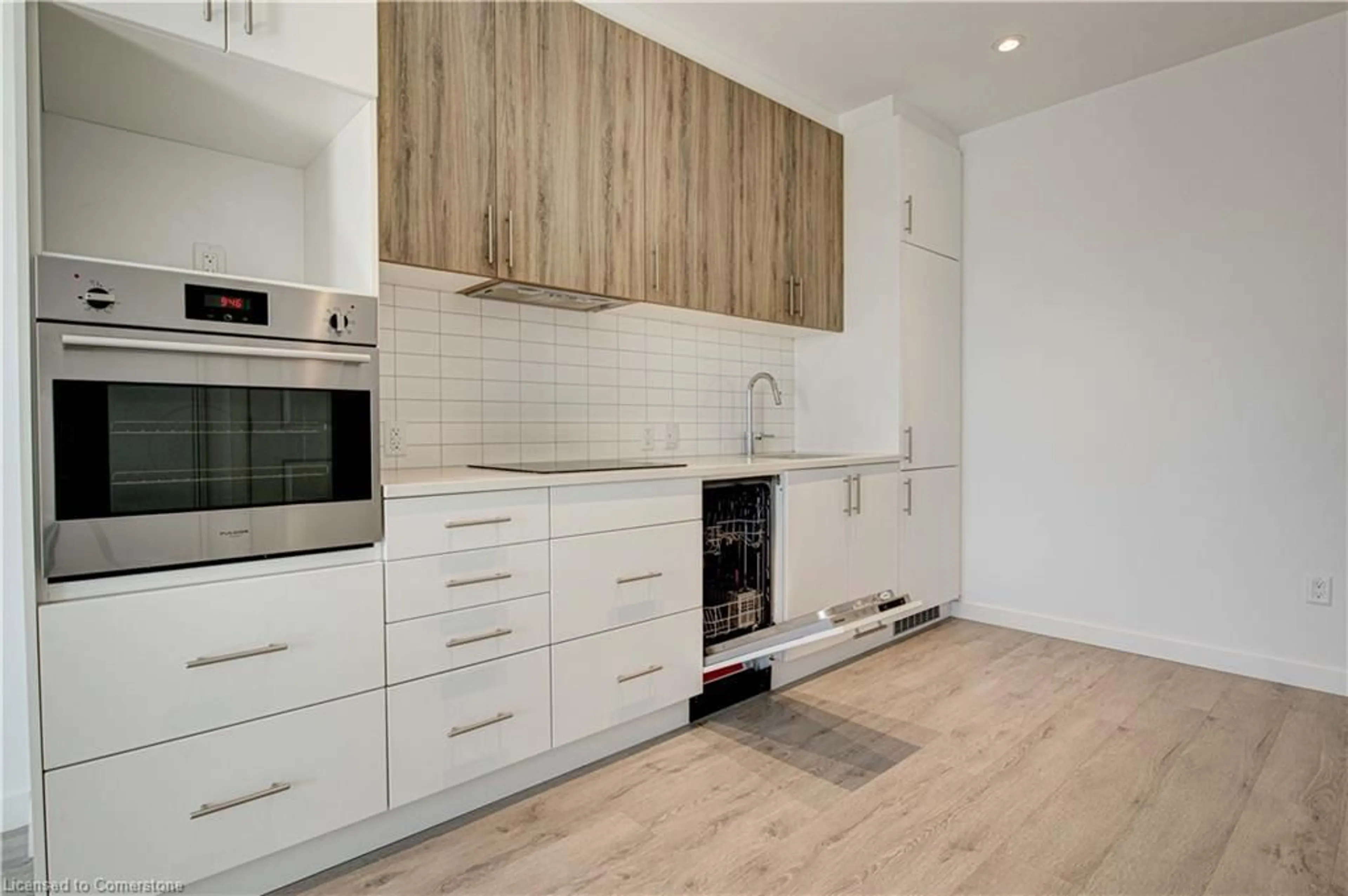 Open concept kitchen, wood/laminate floor for 181 King St #1610, Waterloo Ontario N2J 0E7