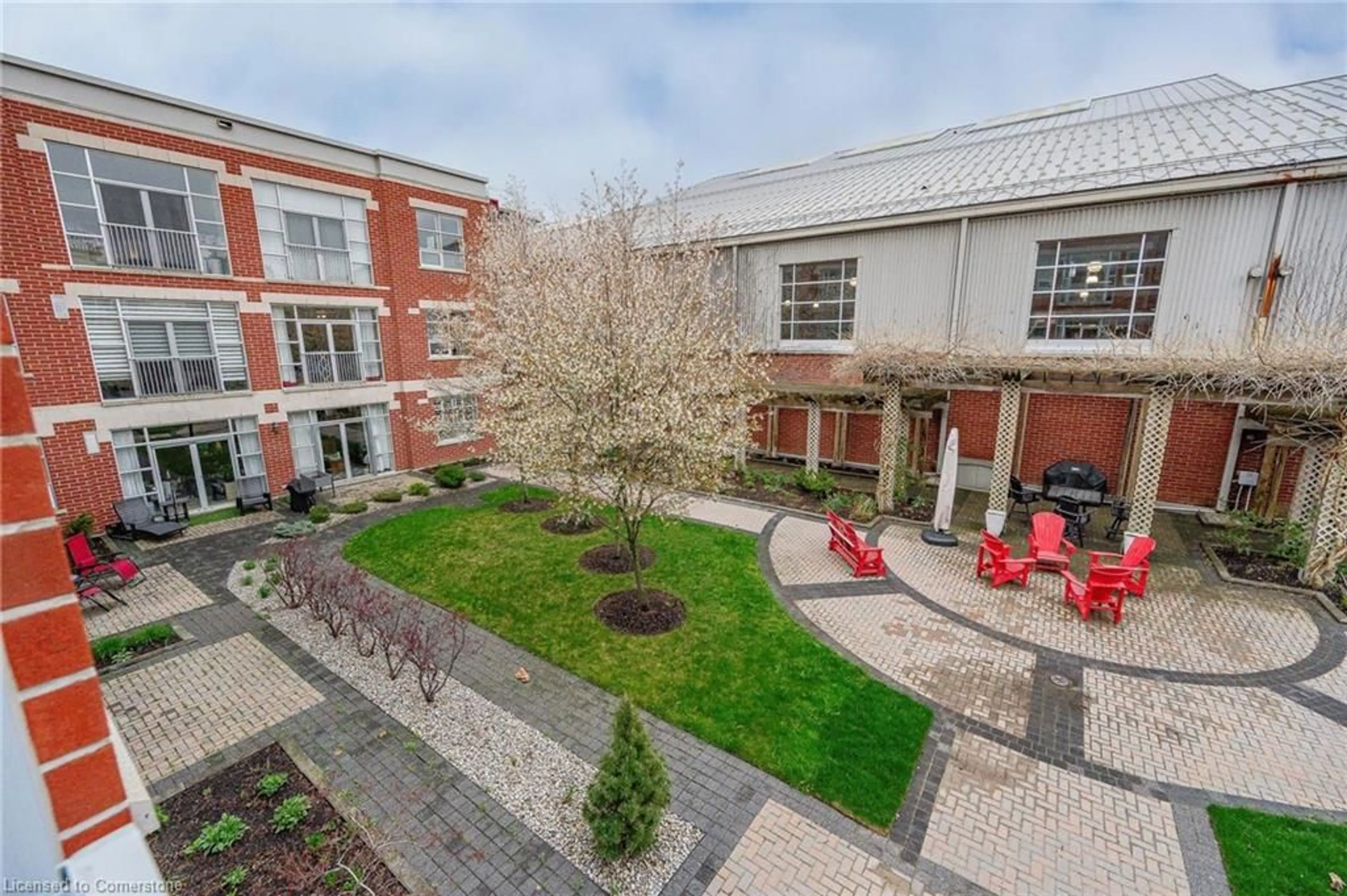 A pic from outside/outdoor area/front of a property/back of a property/a pic from drone, unknown for 165 Duke St #212, Kitchener Ontario N2H 6M4