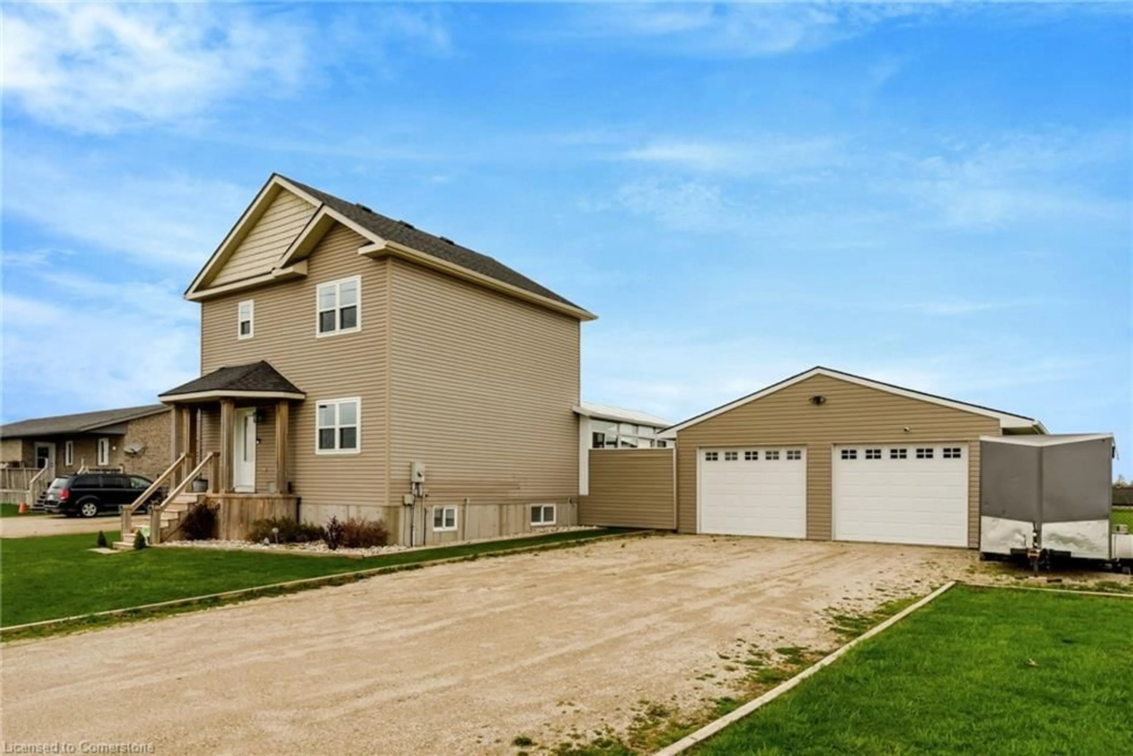 Home with vinyl exterior material, street for 1076 Brussels Line, Wroxeter Ontario N0G 2X0
