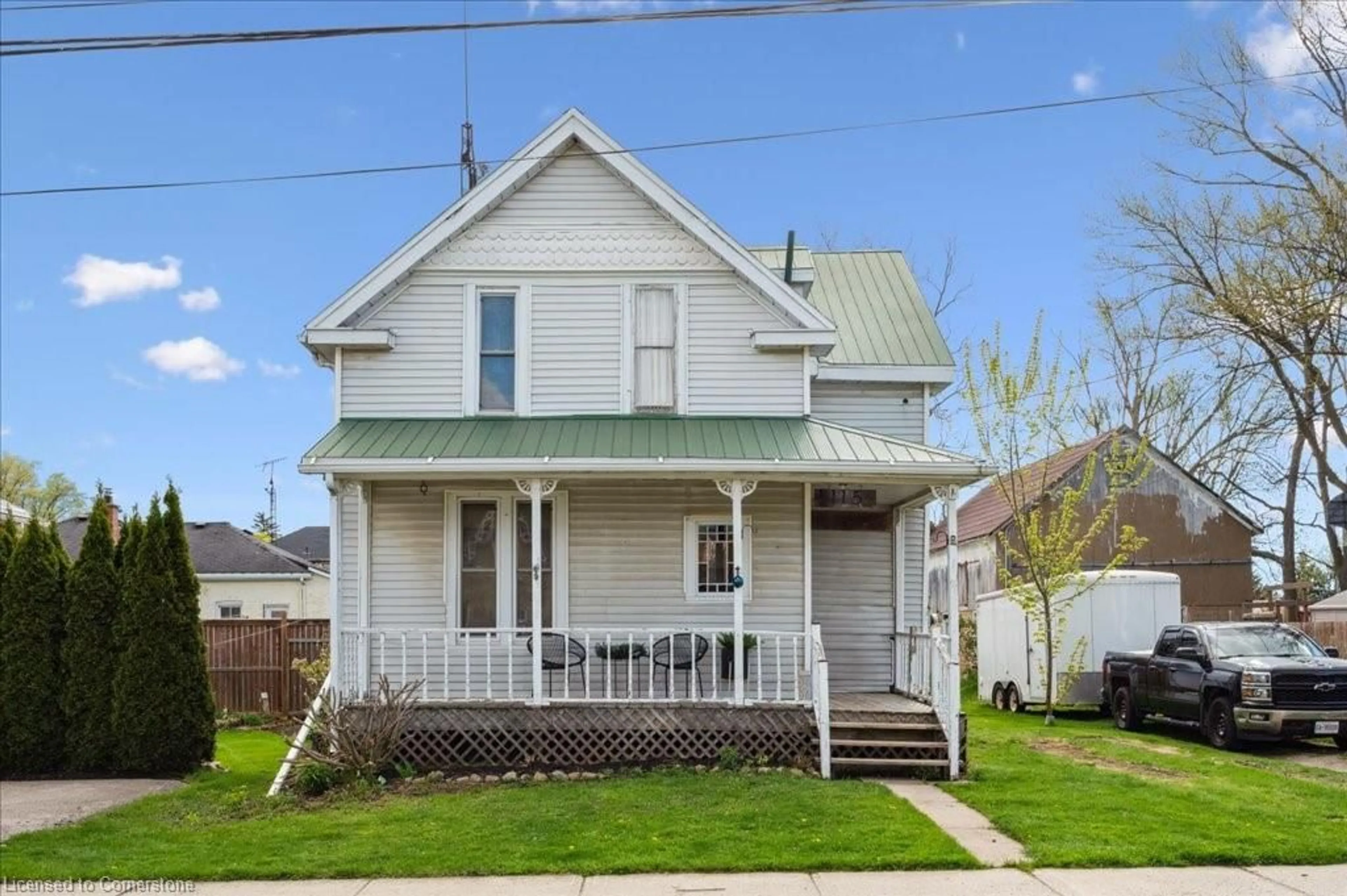 Home with vinyl exterior material, street for 115 Argyle St, Embro Ontario N0J 1J0
