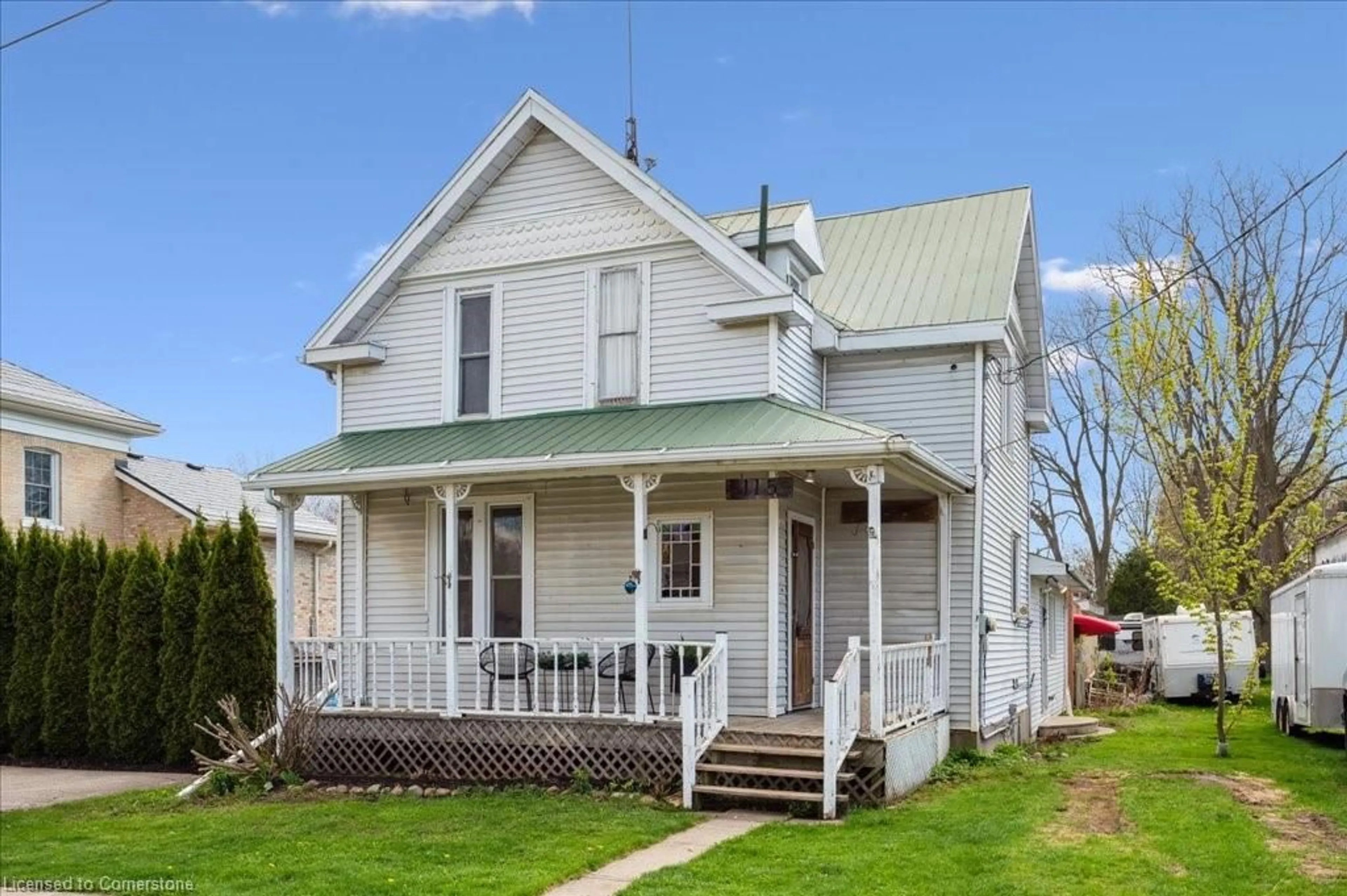 Home with vinyl exterior material, street for 115 Argyle St, Embro Ontario N0J 1J0