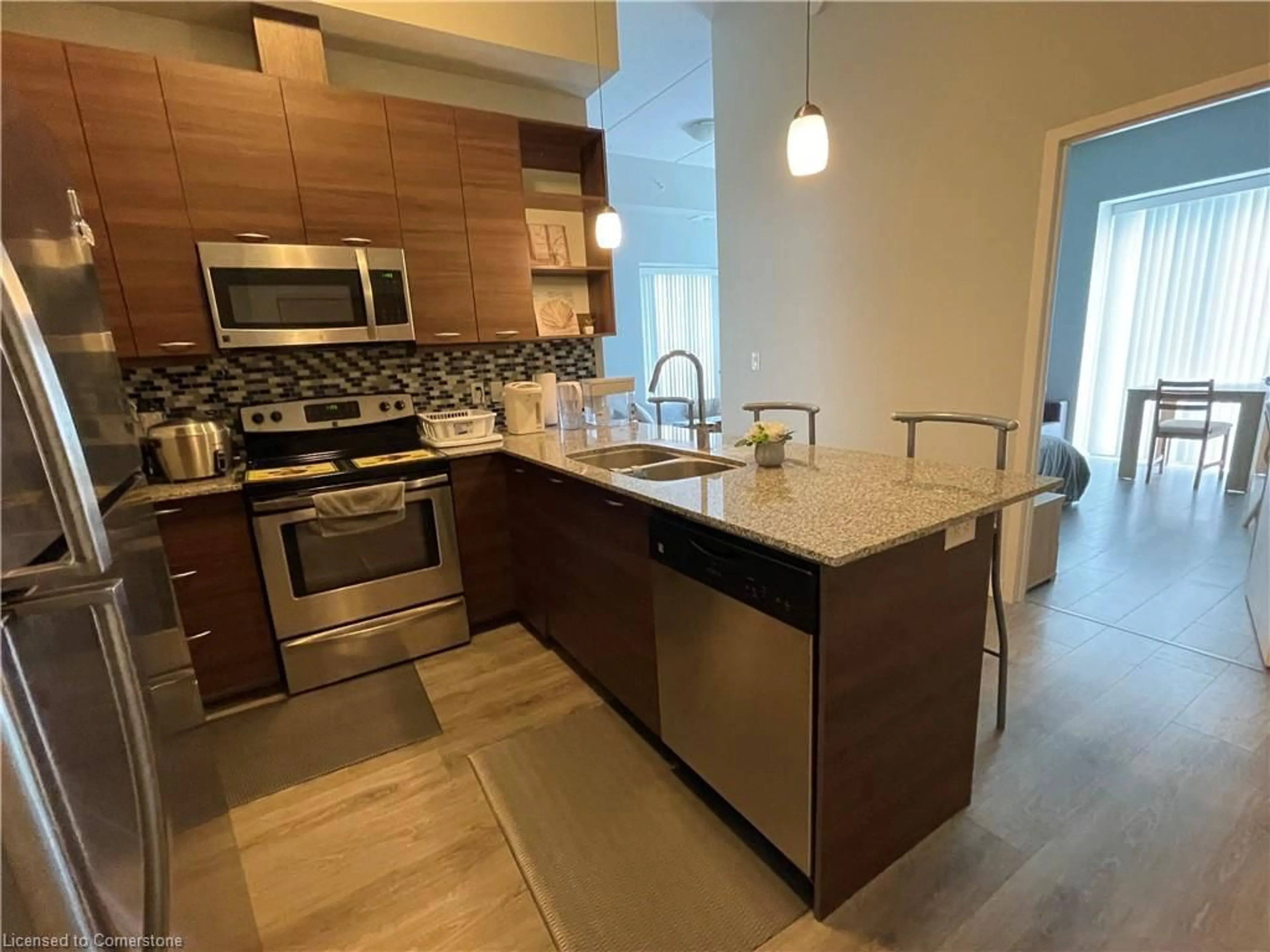 Open concept kitchen, ceramic/tile floor for 318 Spruce St #302, Waterloo Ontario N2L 3M7