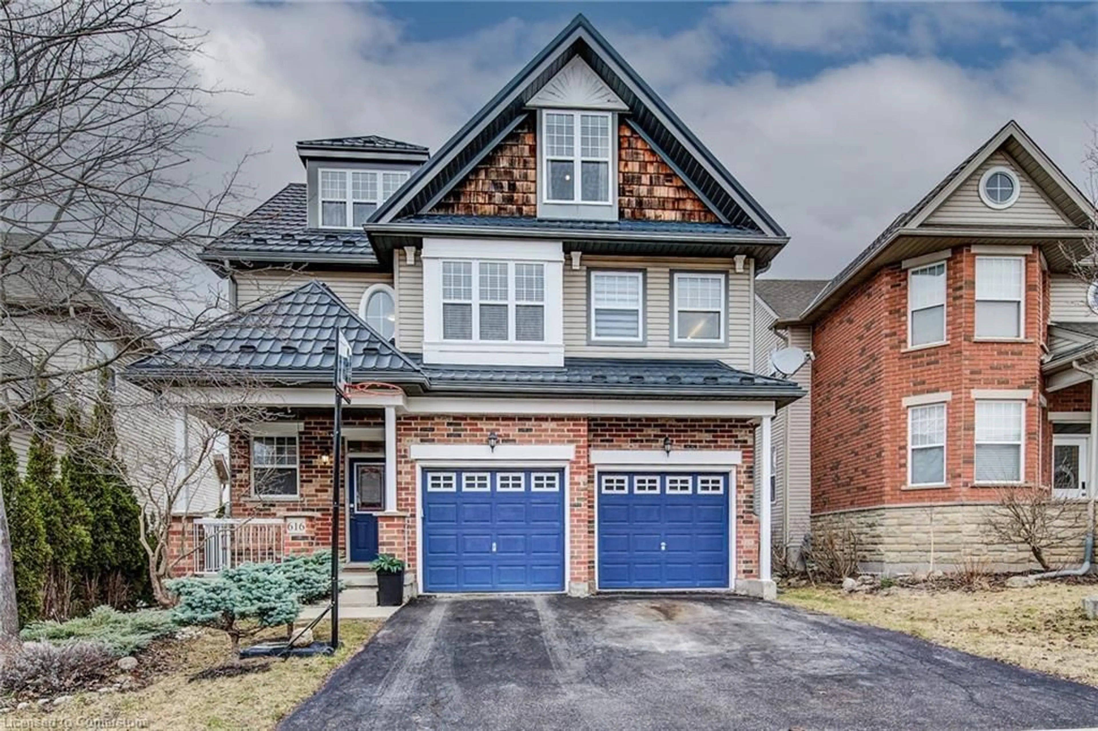 Home with brick exterior material, street for 616 Frieburg Dr, Waterloo Ontario N2T 2Y4