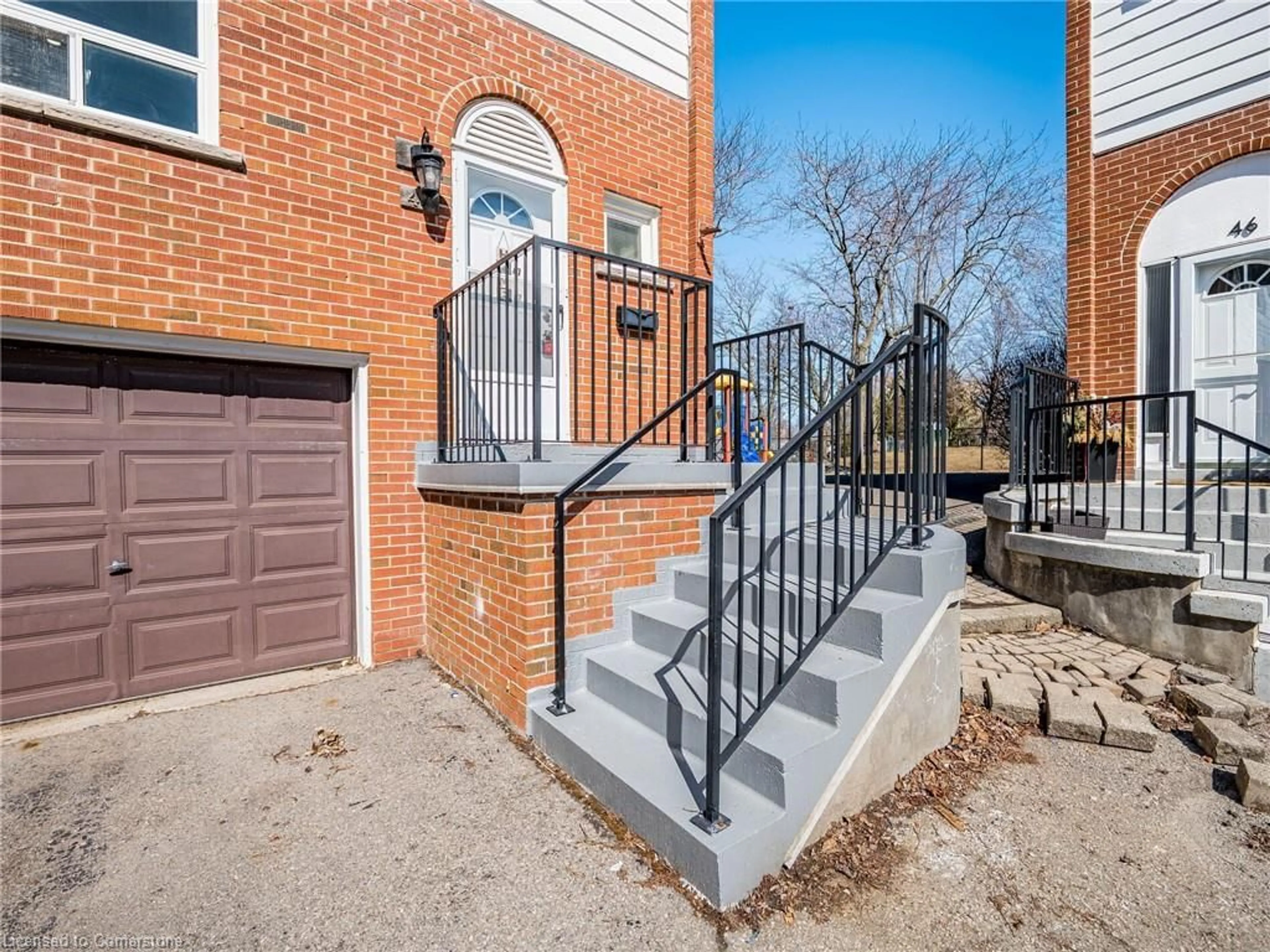 Home with brick exterior material, street for 2445 Homelands Dr #47, Mississauga Ontario L5K 2C6