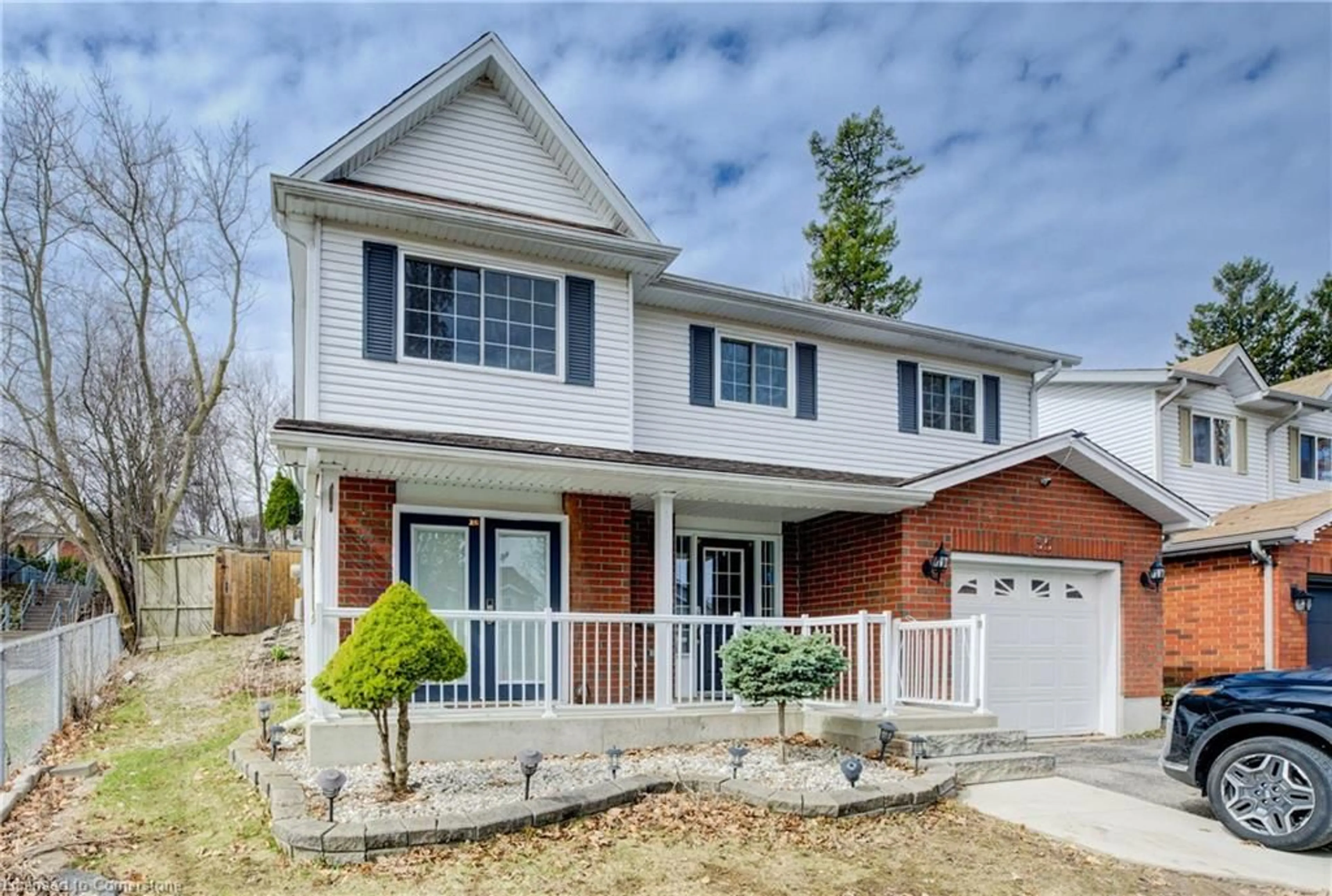 Home with brick exterior material, street for 35 Wildlark Cres, Kitchener Ontario N2N 3E8