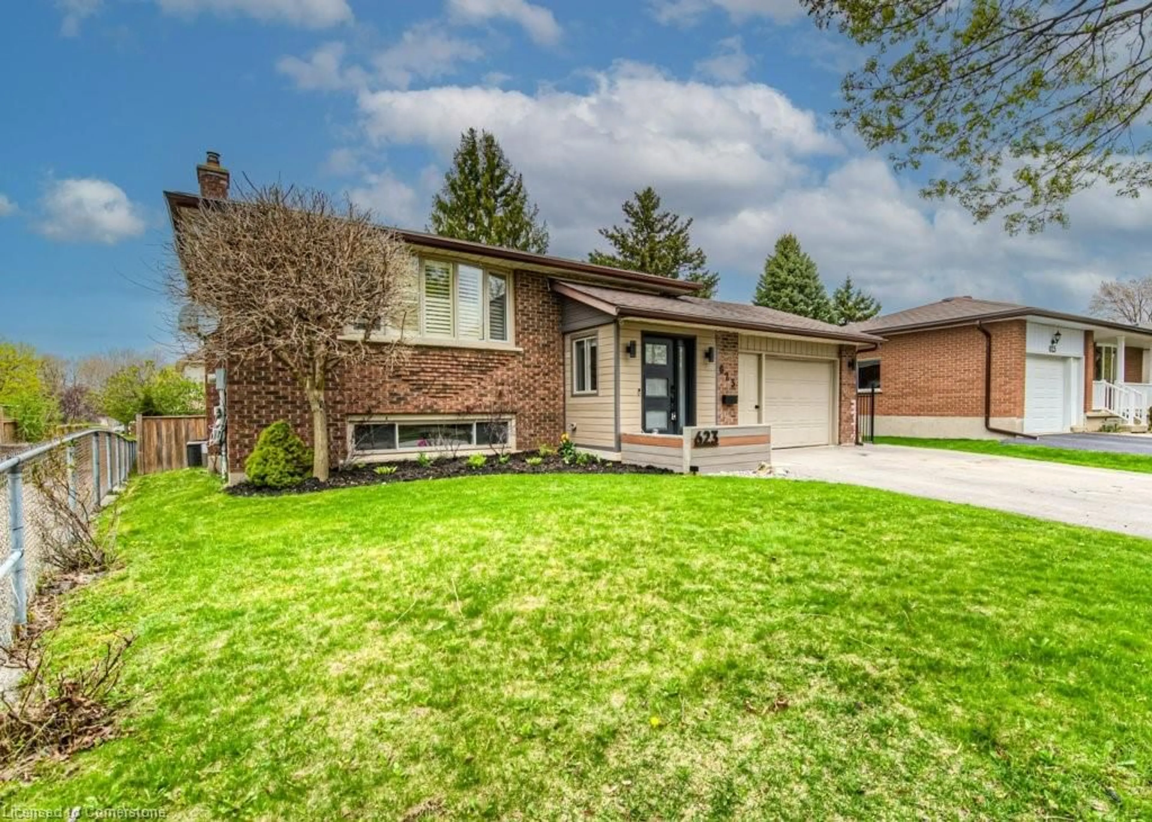 Home with brick exterior material, street for 623 Green Meadow Cres, Waterloo Ontario N2V 1E1