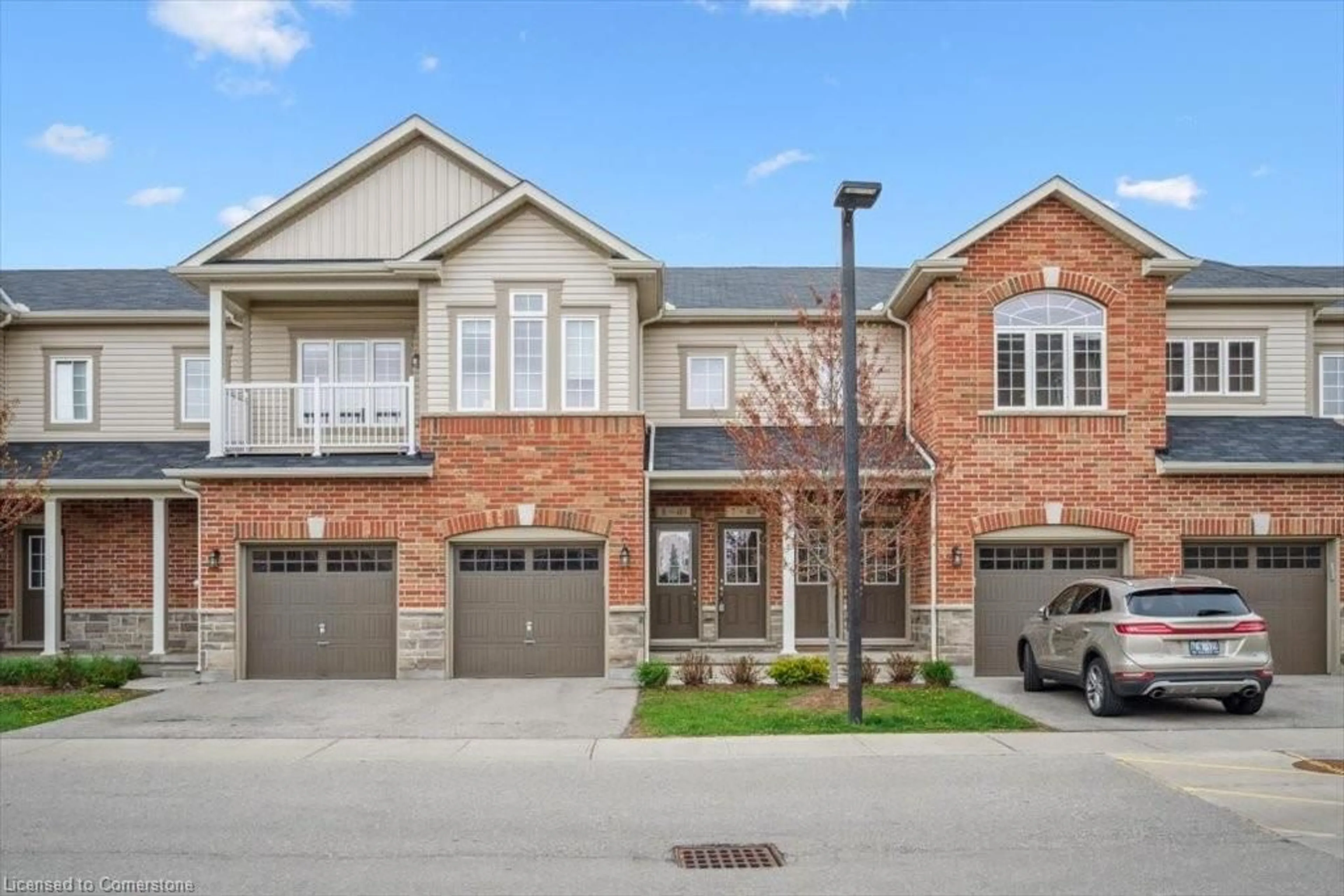 Home with brick exterior material, street for 403 Westwood Dr #7, Kitchener Ontario N2M 0B5