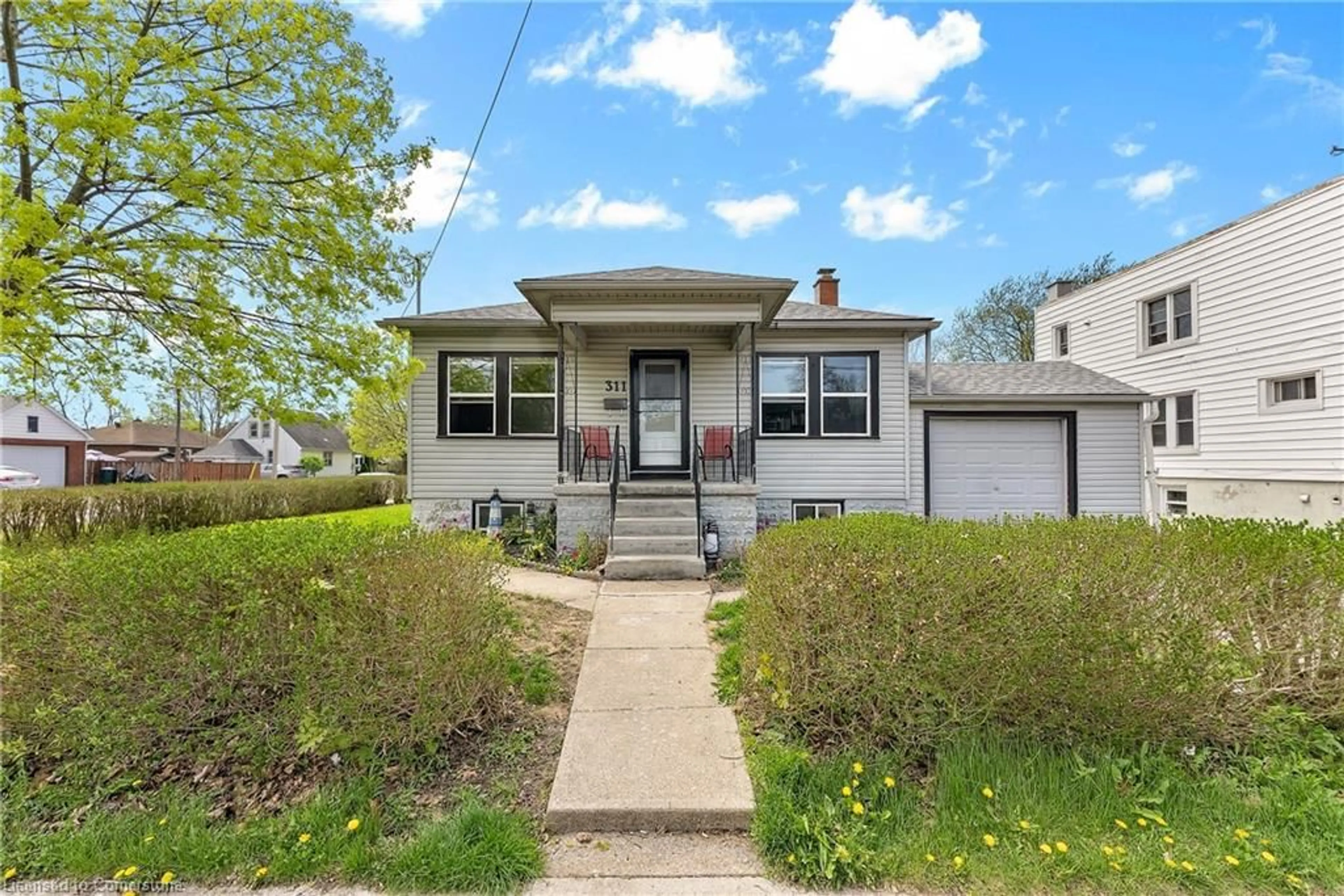 Home with vinyl exterior material, street for 311 Scholfield Ave, Welland Ontario L3B 1N9