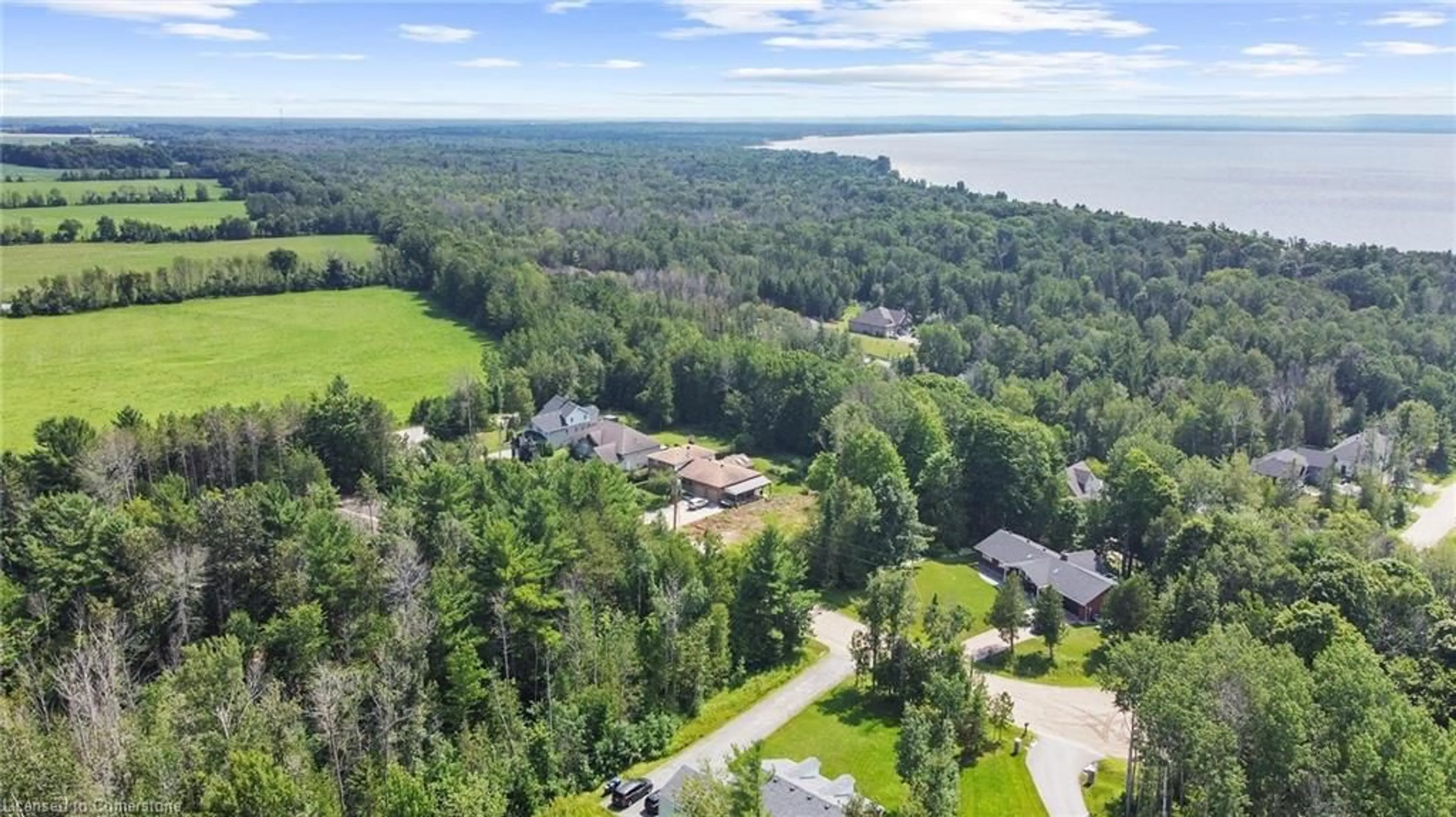 A pic from outside/outdoor area/front of a property/back of a property/a pic from drone, water/lake/river/ocean view for 23 Elizabeth Ave, Tiny Ontario L0L 1P1