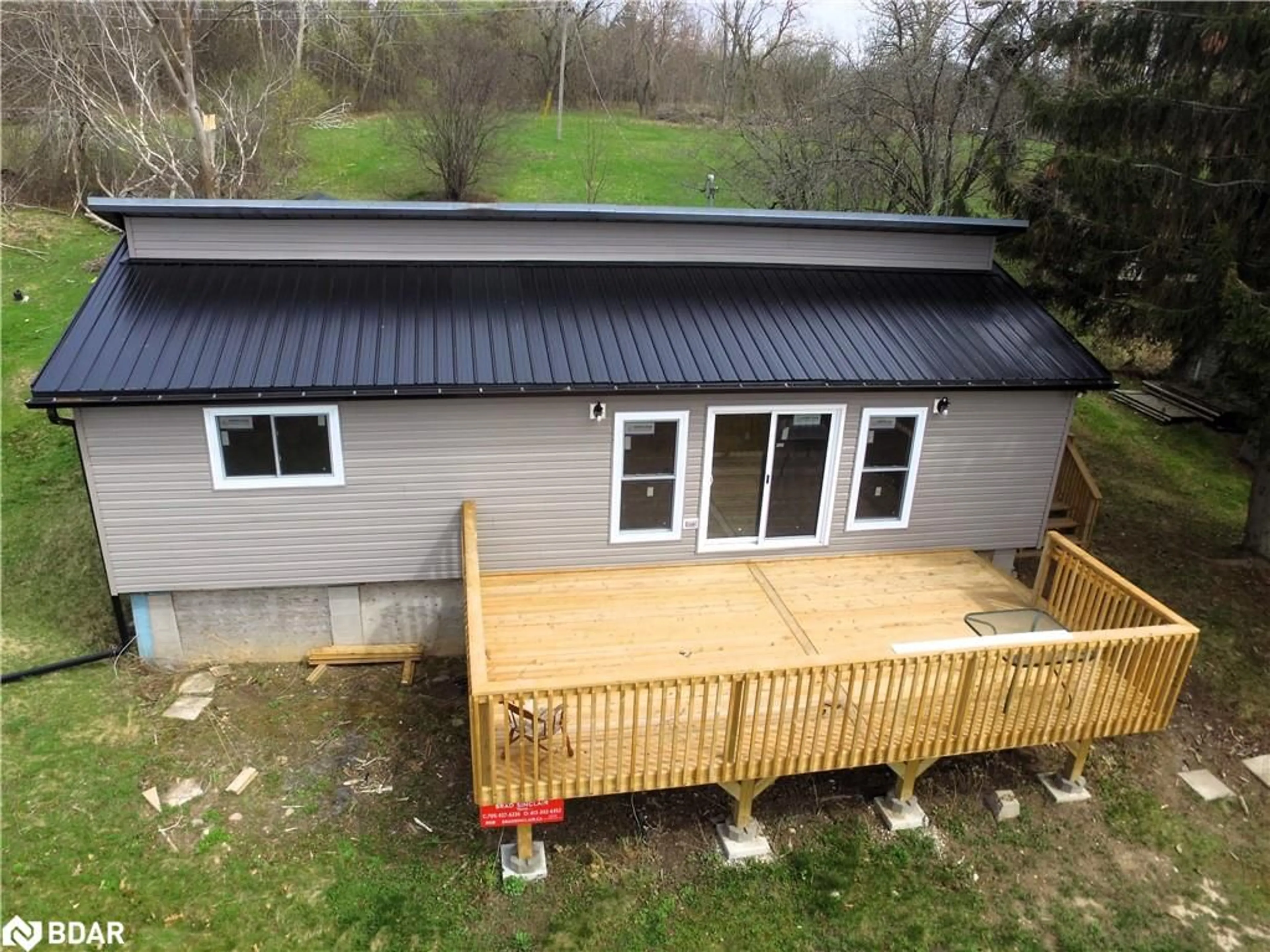 A pic from outside/outdoor area/front of a property/back of a property/a pic from drone, building for 53 Long Island, Bailieboro Ontario K0L 1B0