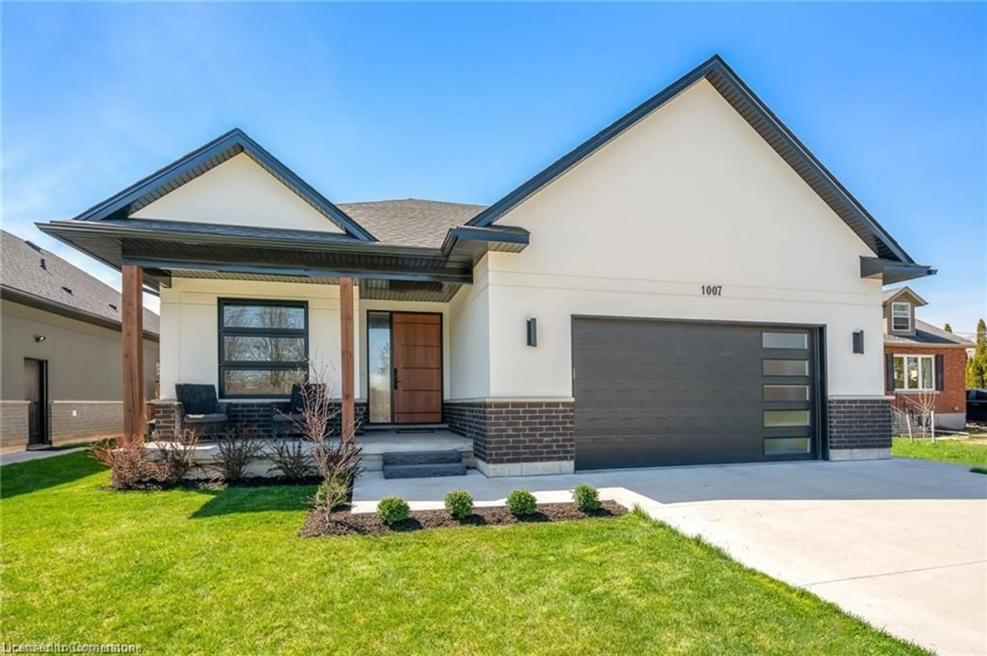 Home with brick exterior material, street for 1007 Clare Avenue, Pelham Ontario L3C 3C2