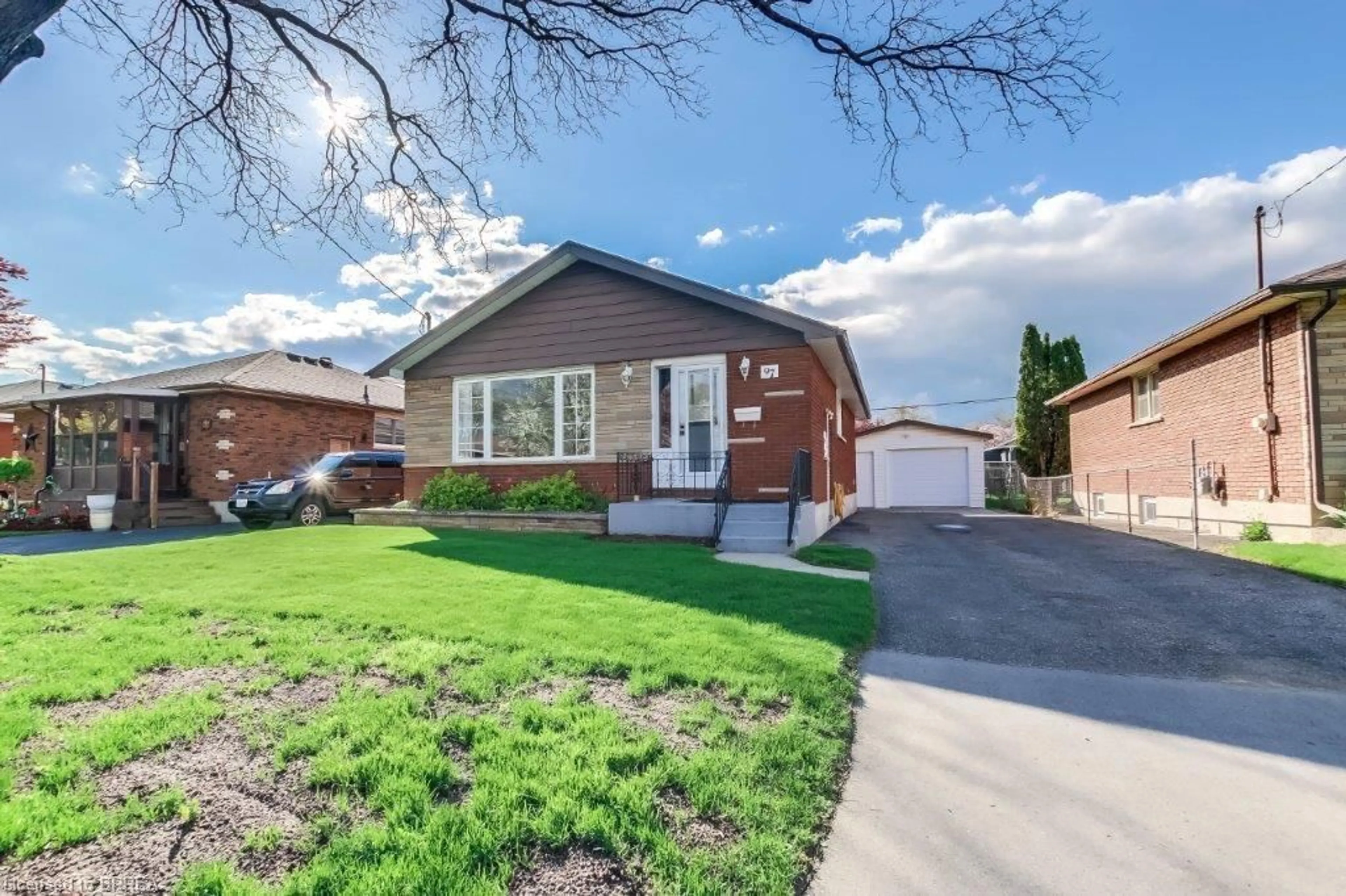 Home with brick exterior material, street for 97 Seventh Ave, Brantford Ontario N3S 1B7