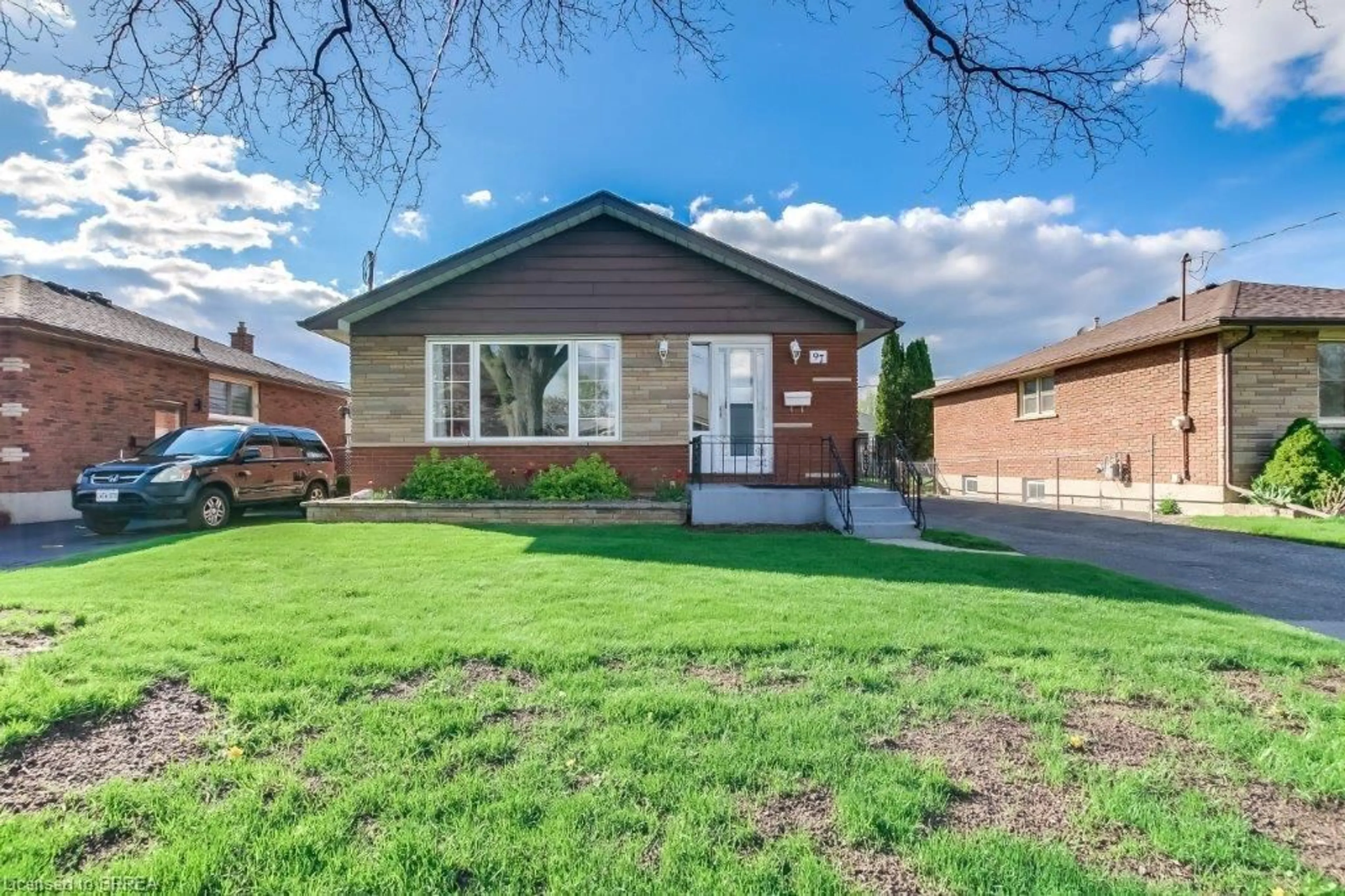 Home with brick exterior material, street for 97 Seventh Ave, Brantford Ontario N3S 1B7