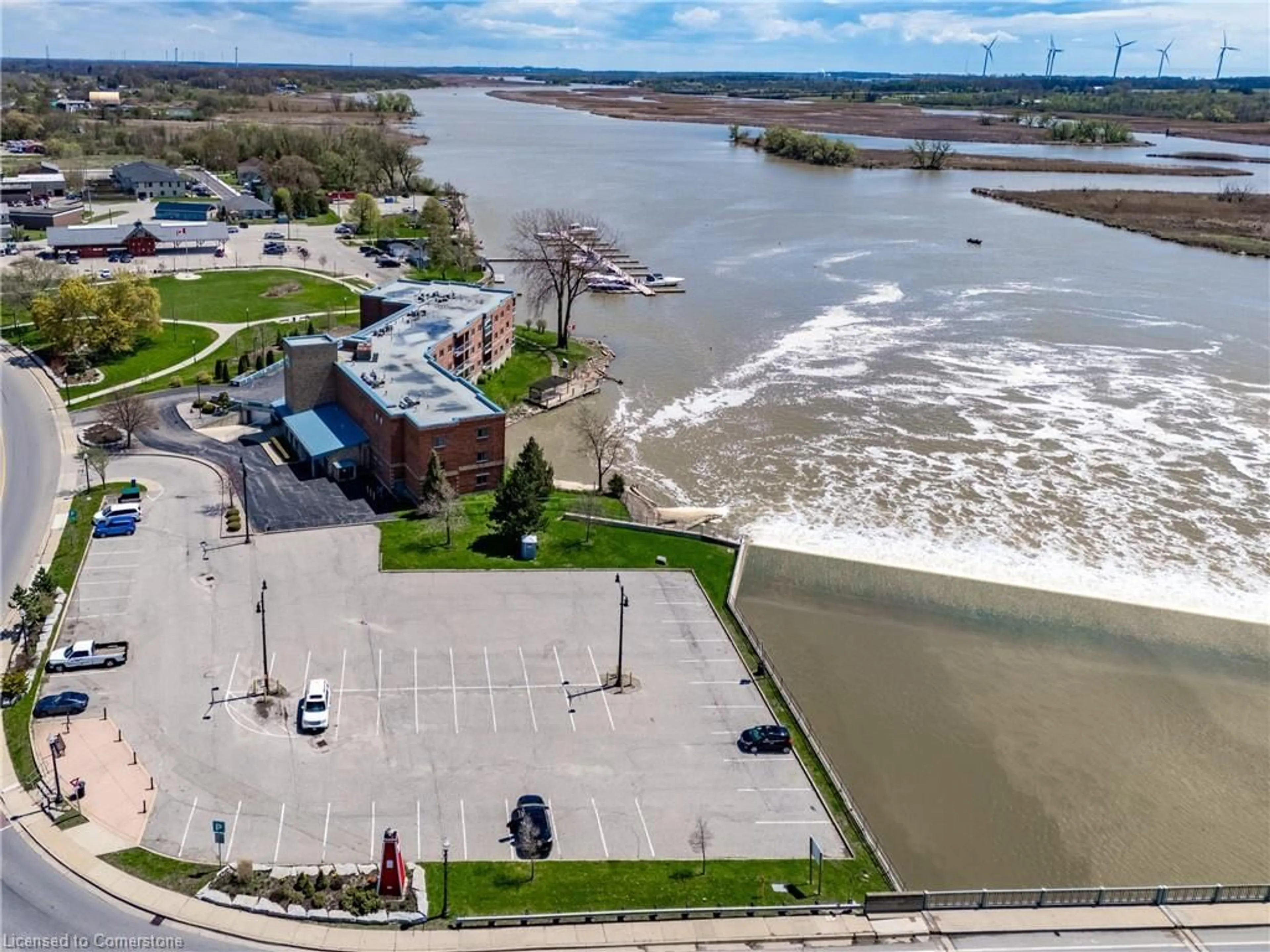 A pic from outside/outdoor area/front of a property/back of a property/a pic from drone, water/lake/river/ocean view for 210 Main St #309, Dunnville Ontario N1A 3G7