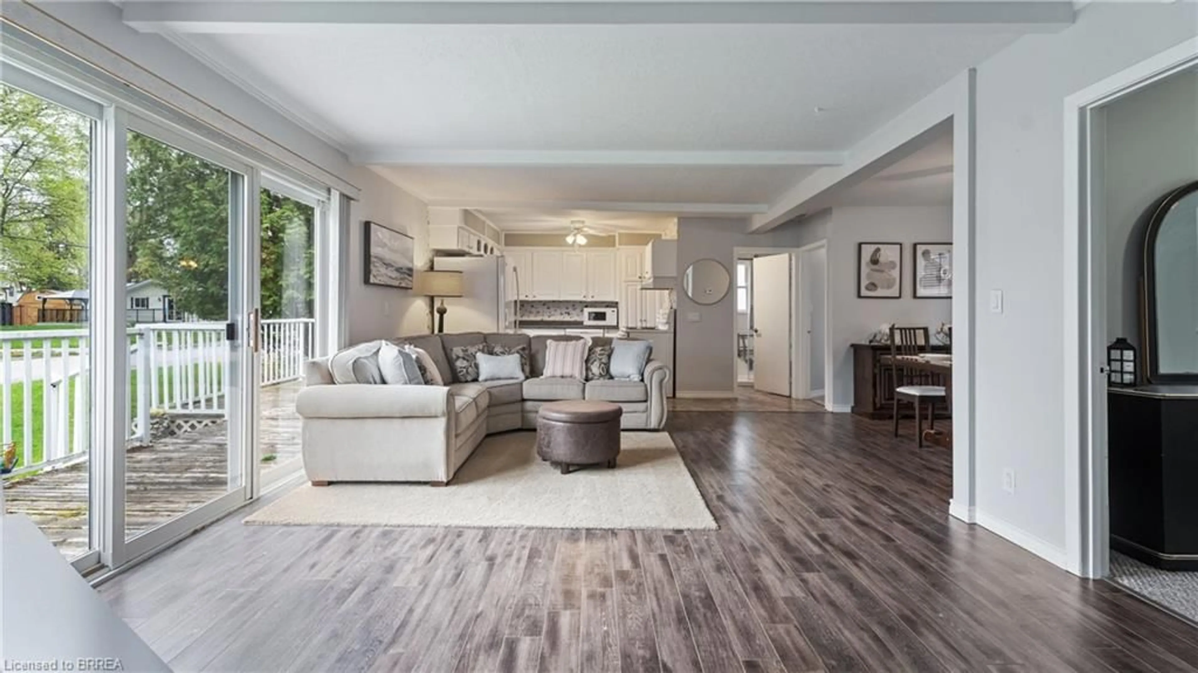 Living room with furniture, wood/laminate floor for 303 Cedar Dr, Turkey Point Ontario N0E 1T0