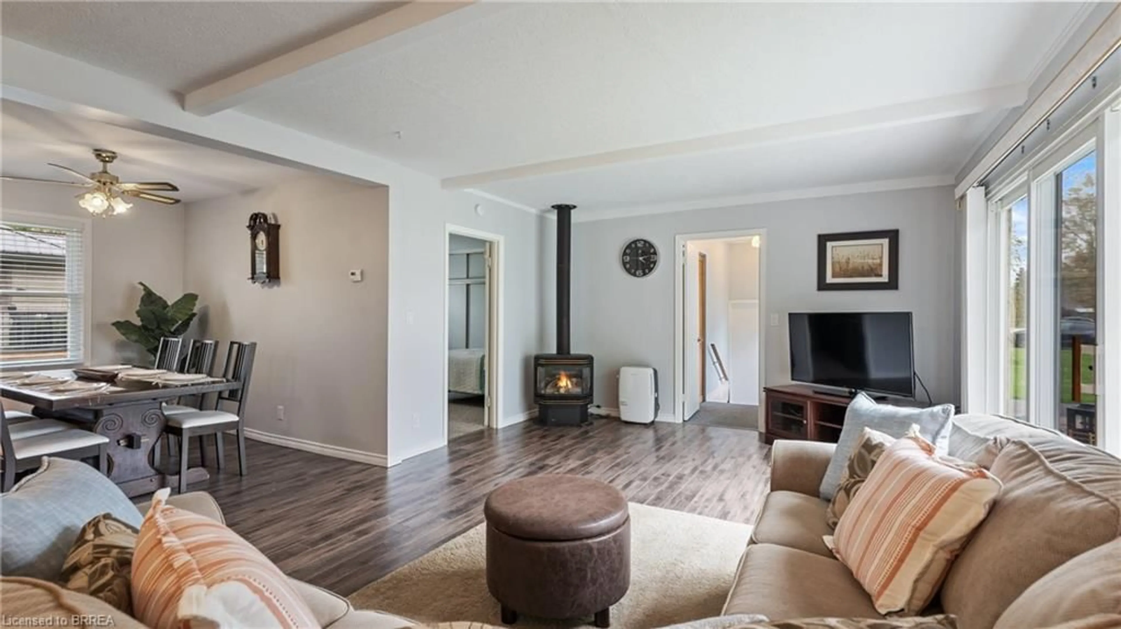 Living room with furniture, wood/laminate floor for 303 Cedar Dr, Turkey Point Ontario N0E 1T0