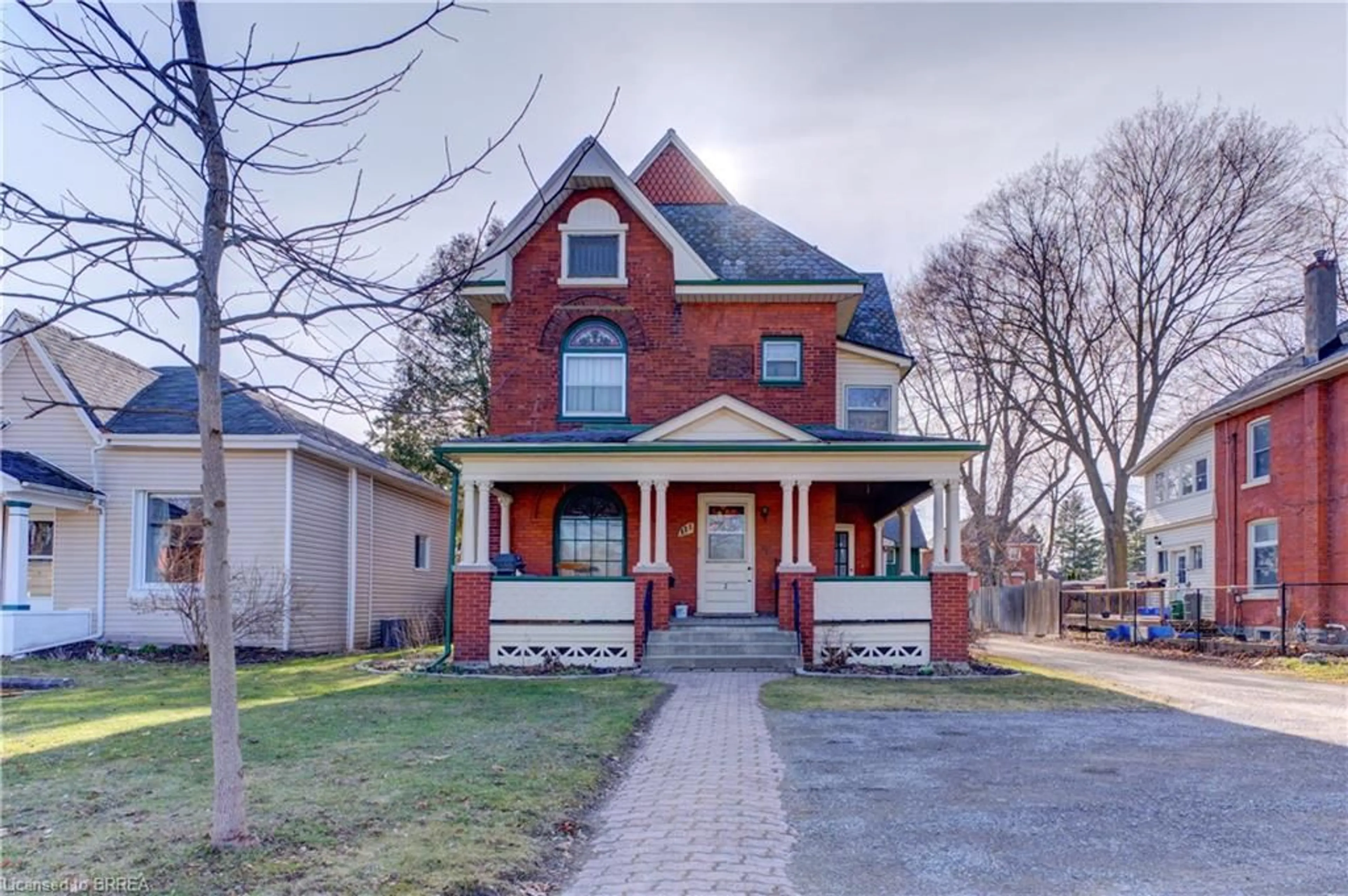 Home with brick exterior material, street for 111 Erie Ave, Brantford Ontario N3S 2G3
