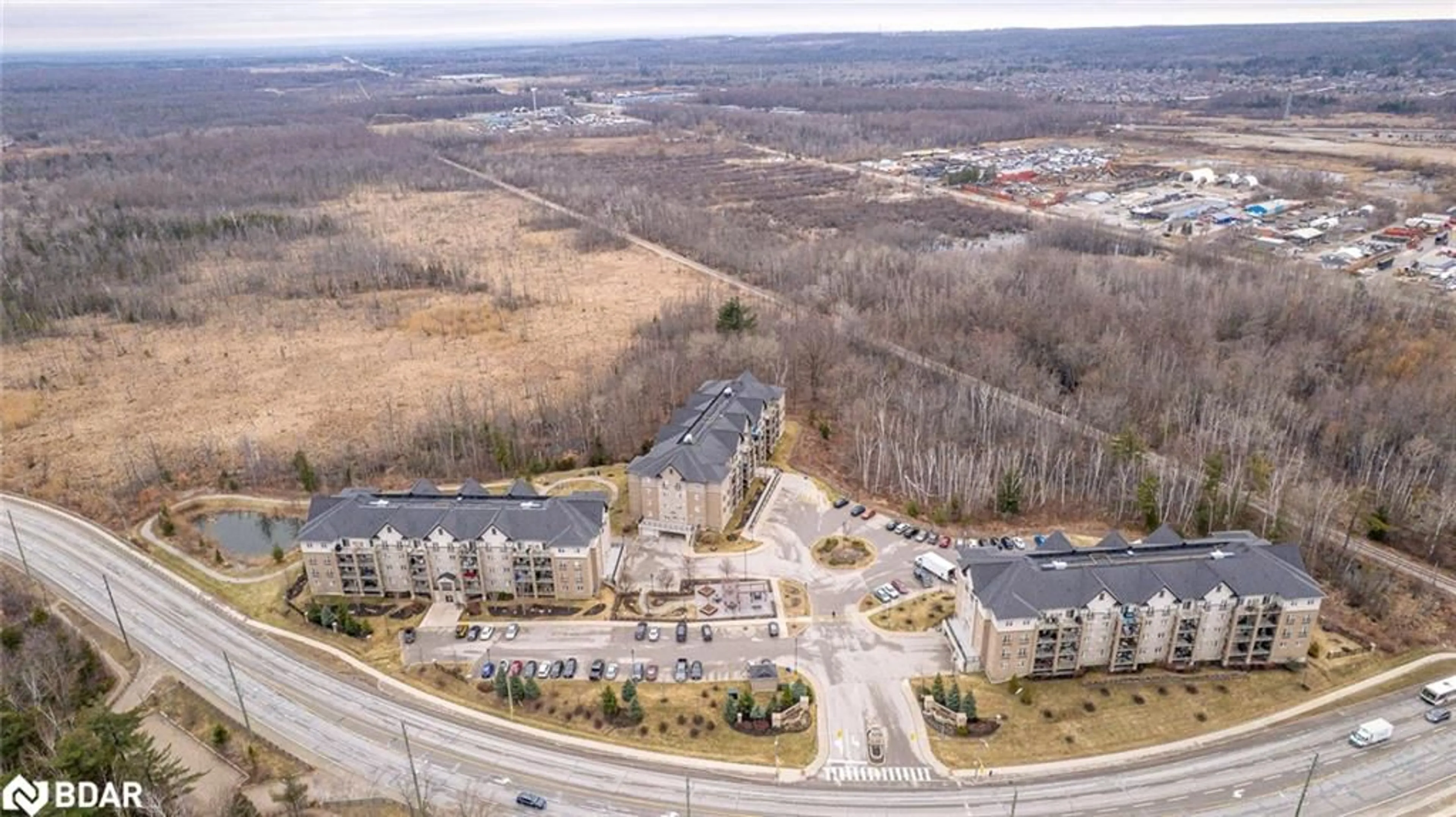A pic from outside/outdoor area/front of a property/back of a property/a pic from drone, mountain view for 42 Ferndale Dr #107, Barrie Ontario L4N 2M5