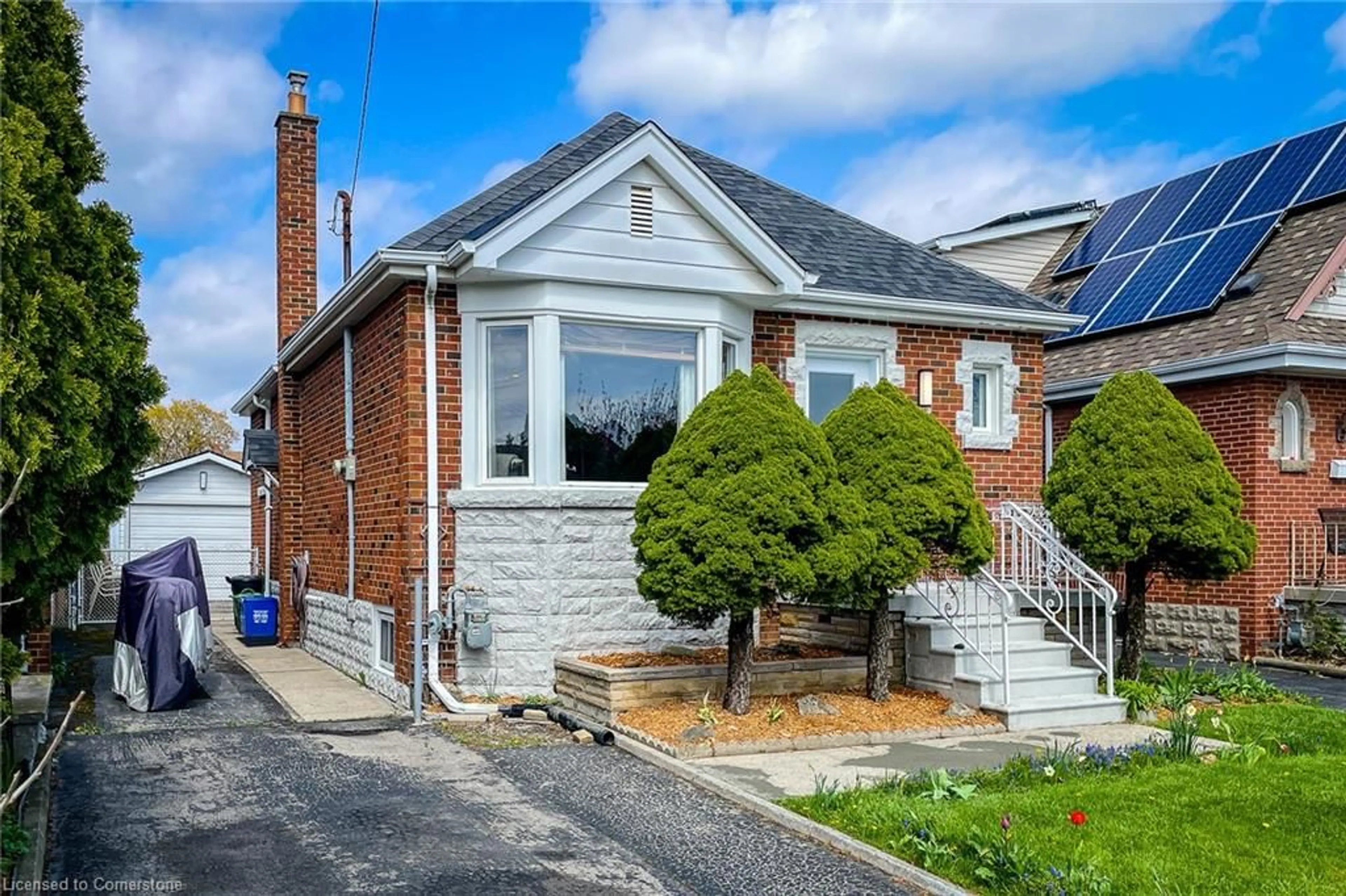Home with brick exterior material, street for 112 Tragina Ave, Hamilton Ontario L8K 2Z6