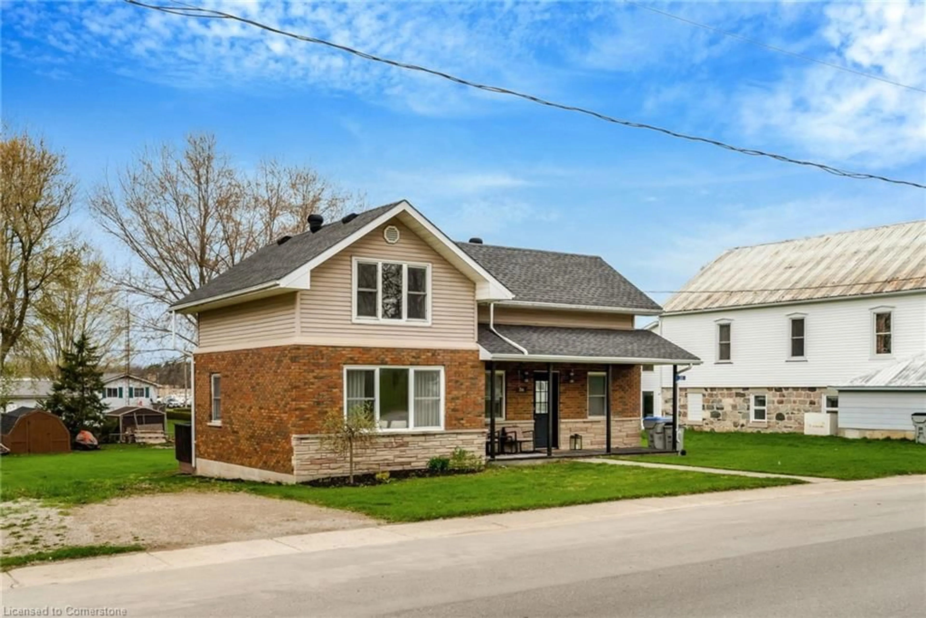 Home with brick exterior material, street for 36 Clyde St, Bluevale Ontario N0G 1G0