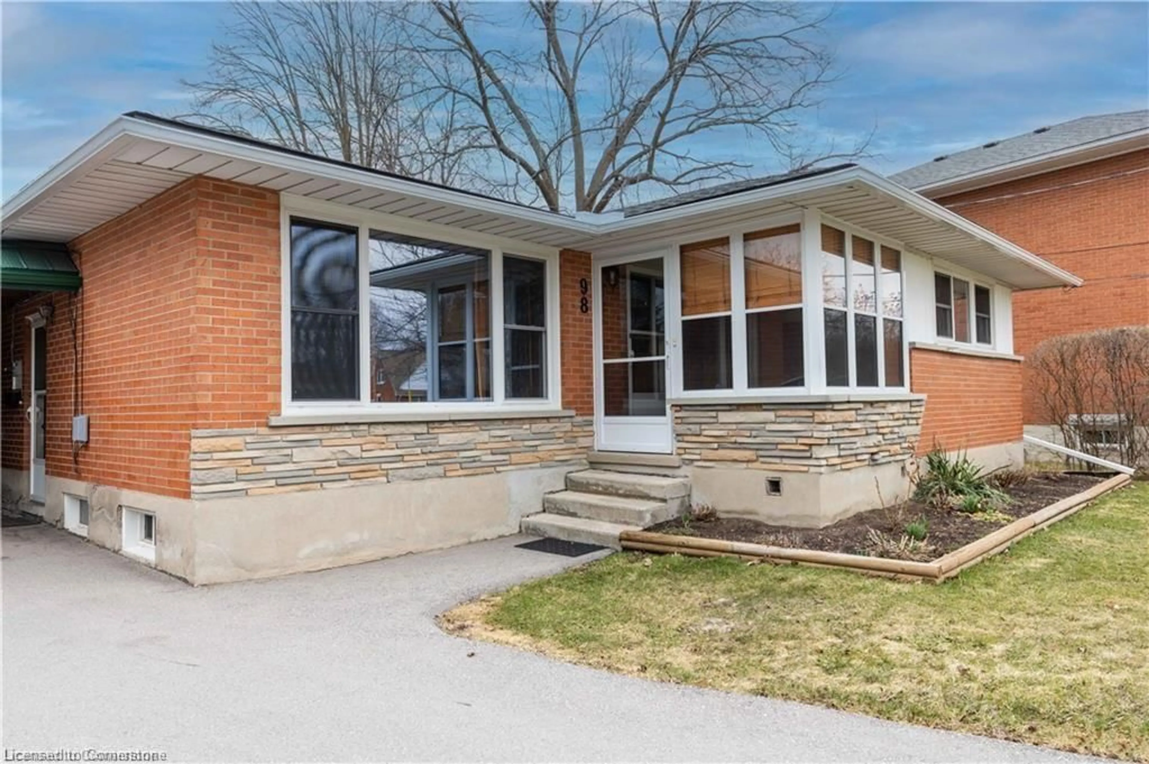 Home with brick exterior material, street for 98 Clive Rd, Kitchener Ontario N2H 3N6