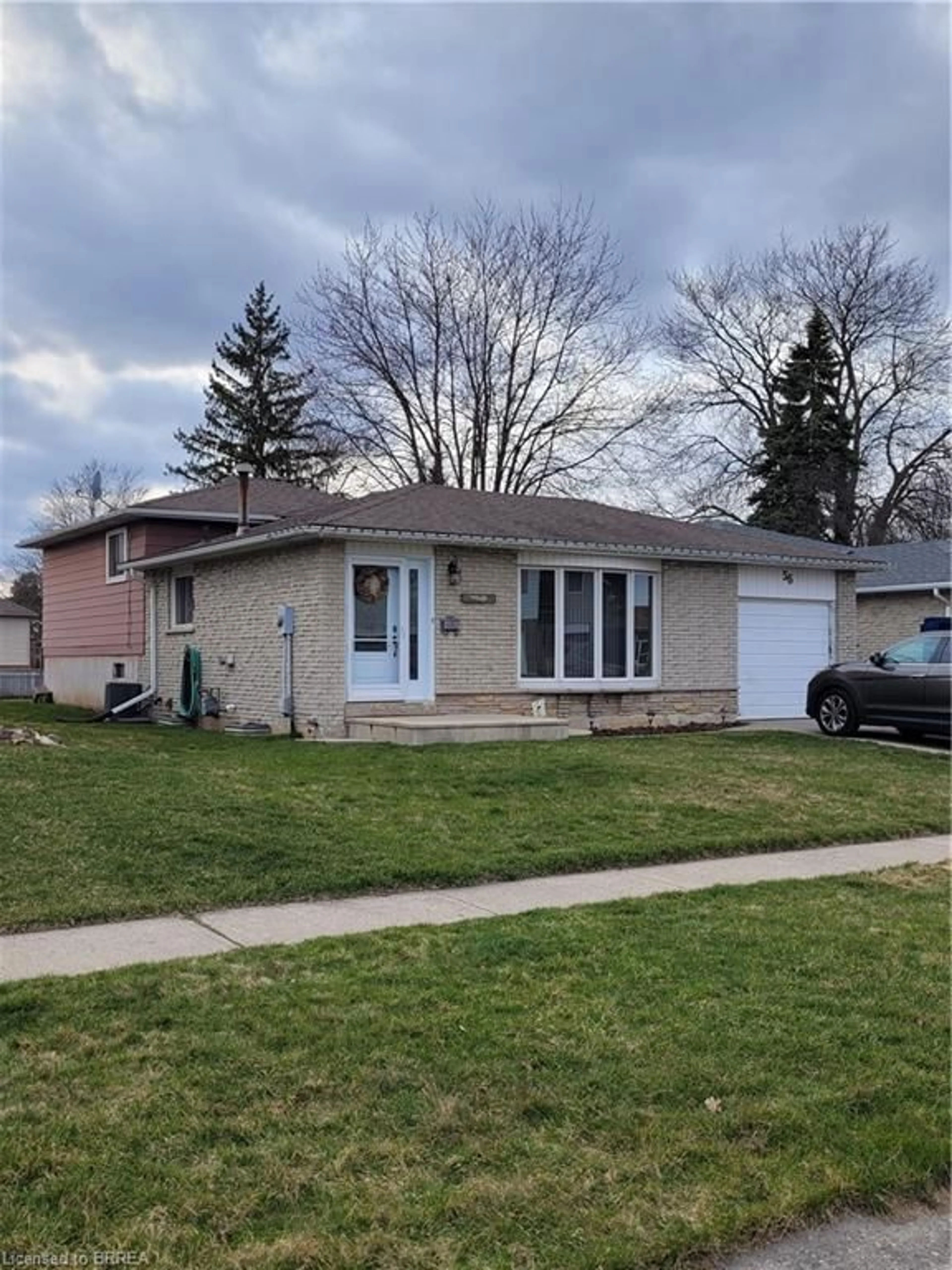 Home with brick exterior material, street for 56 Abeles Ave, Paris Ontario N3L 3N9