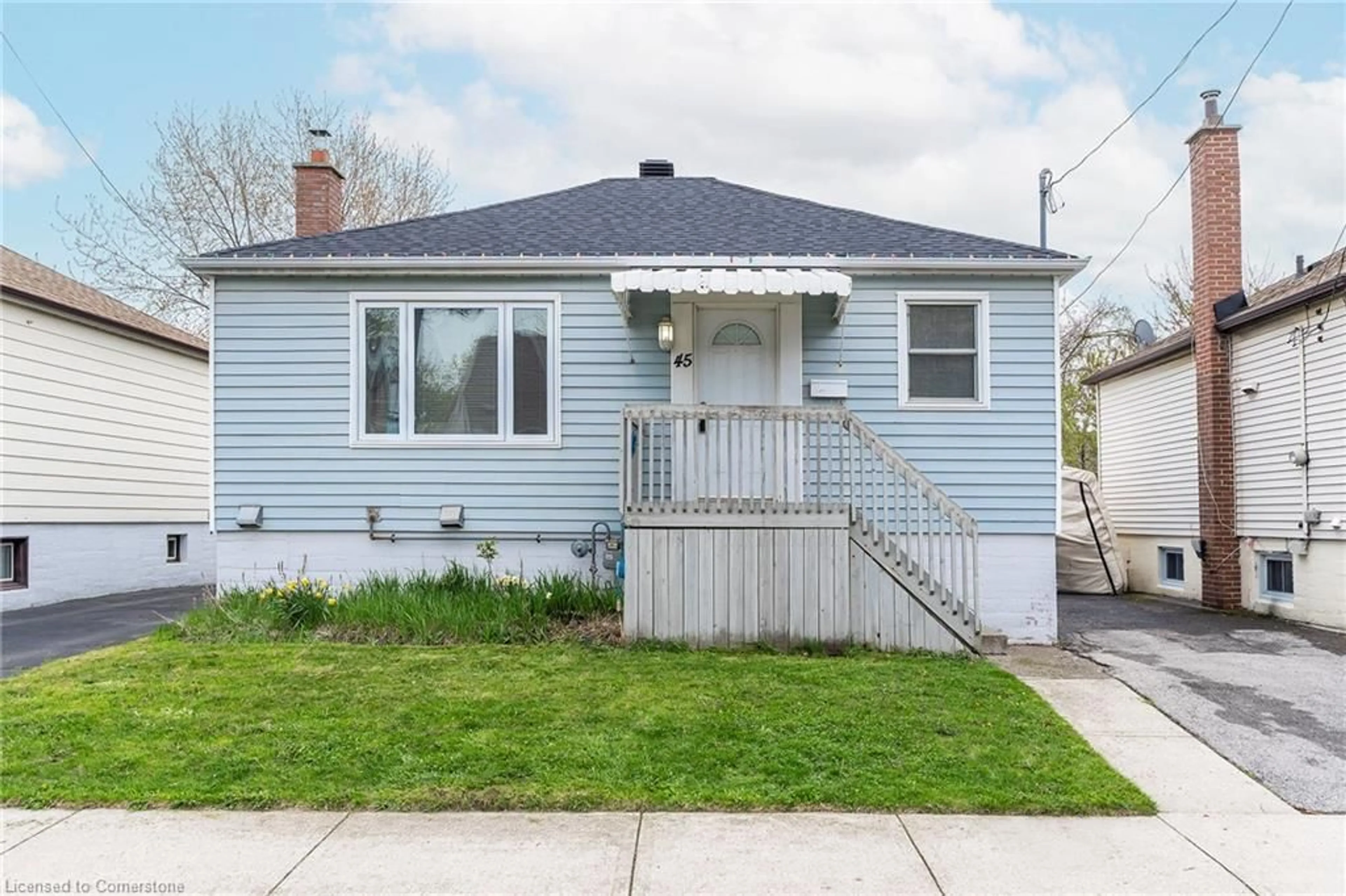 Home with vinyl exterior material, street for 45 East 11th St, Hamilton Ontario L9A 3T1