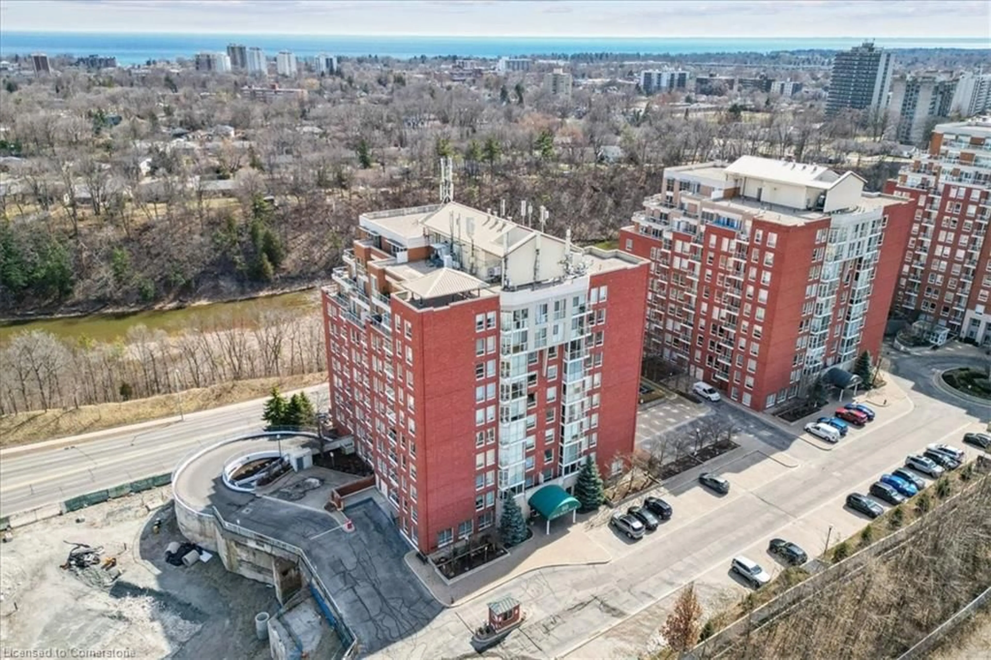 A pic from outside/outdoor area/front of a property/back of a property/a pic from drone, city buildings view from balcony for 60 Old Mill Rd #603, Oakville Ontario L6J 7V9
