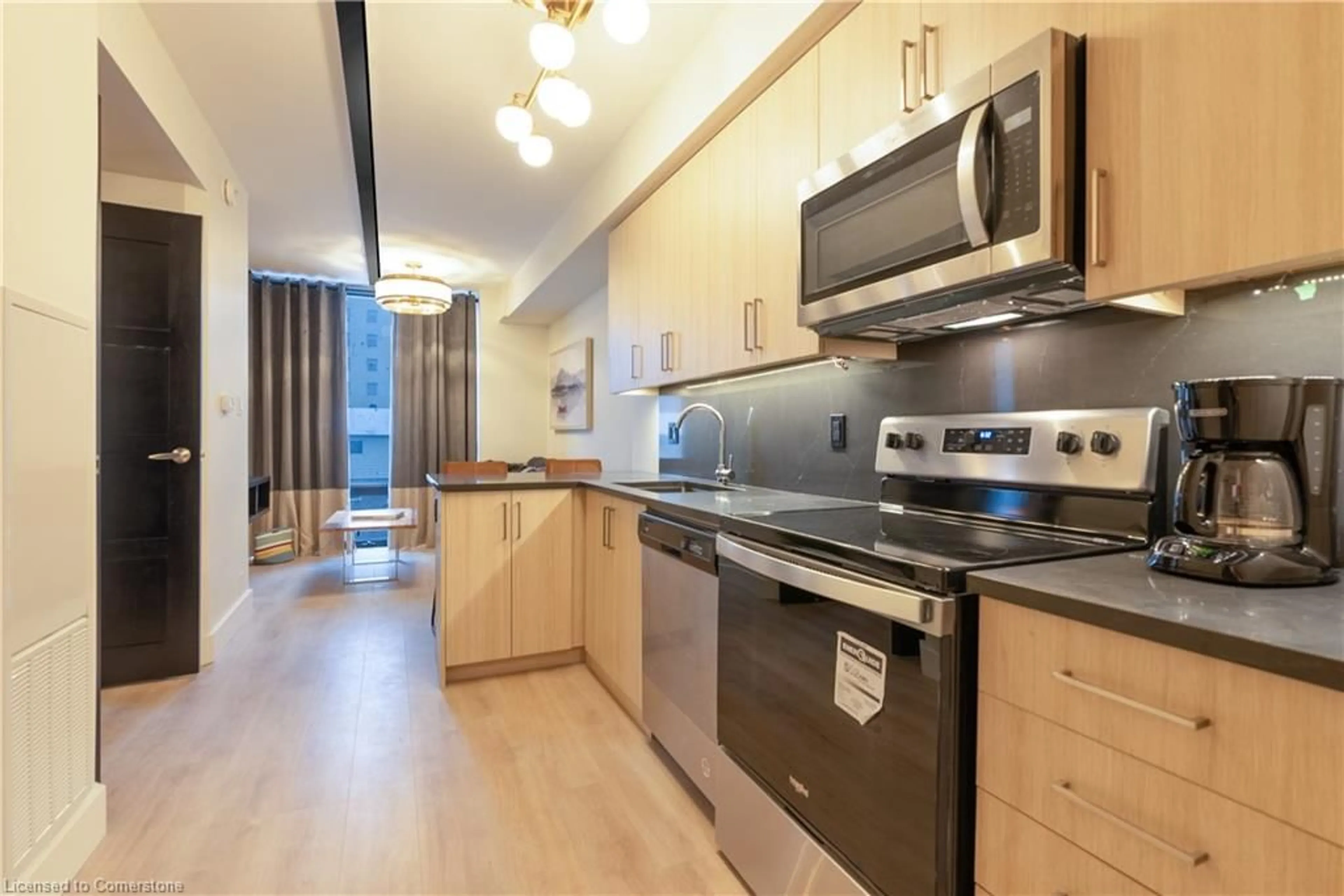 Standard kitchen, wood/laminate floor for 145 Columbia St #703, Waterloo Ontario N2L 0K7