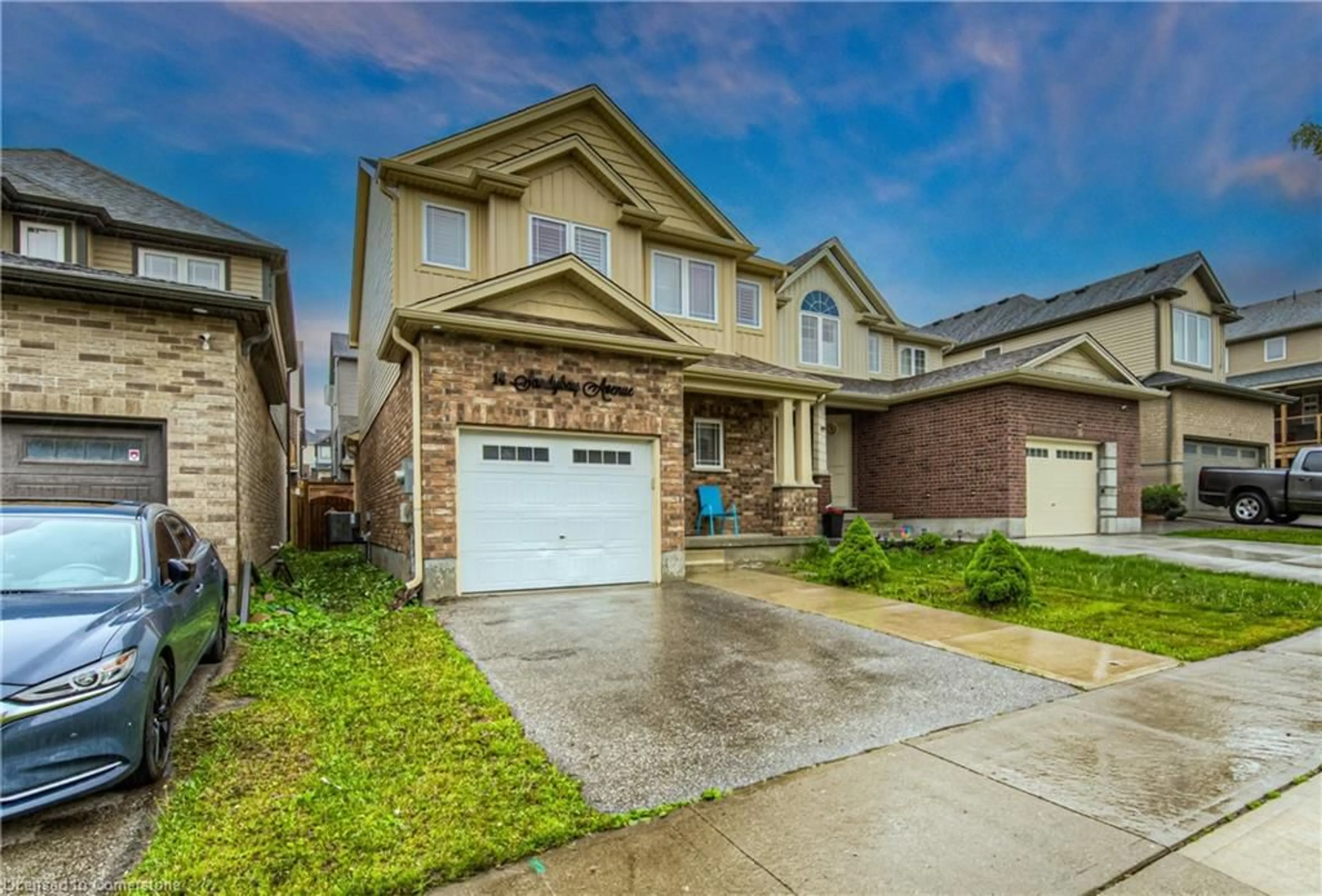 Home with brick exterior material, street for 14 Sandybay Ave, Kitchener Ontario N2A 0H7