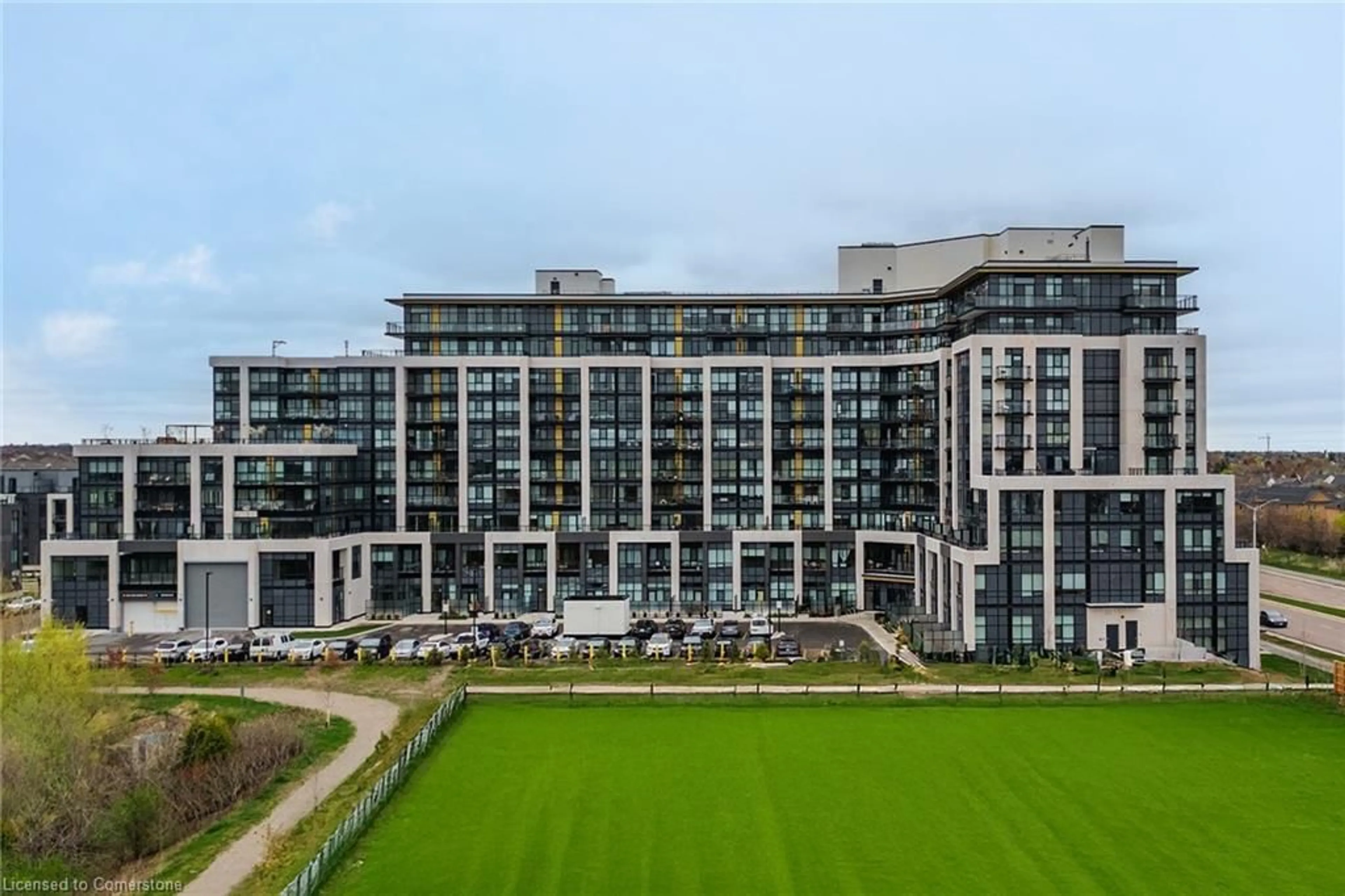 A pic from outside/outdoor area/front of a property/back of a property/a pic from drone, city buildings view from balcony for 405 Dundas St #307, Oakville Ontario L6M 5P9
