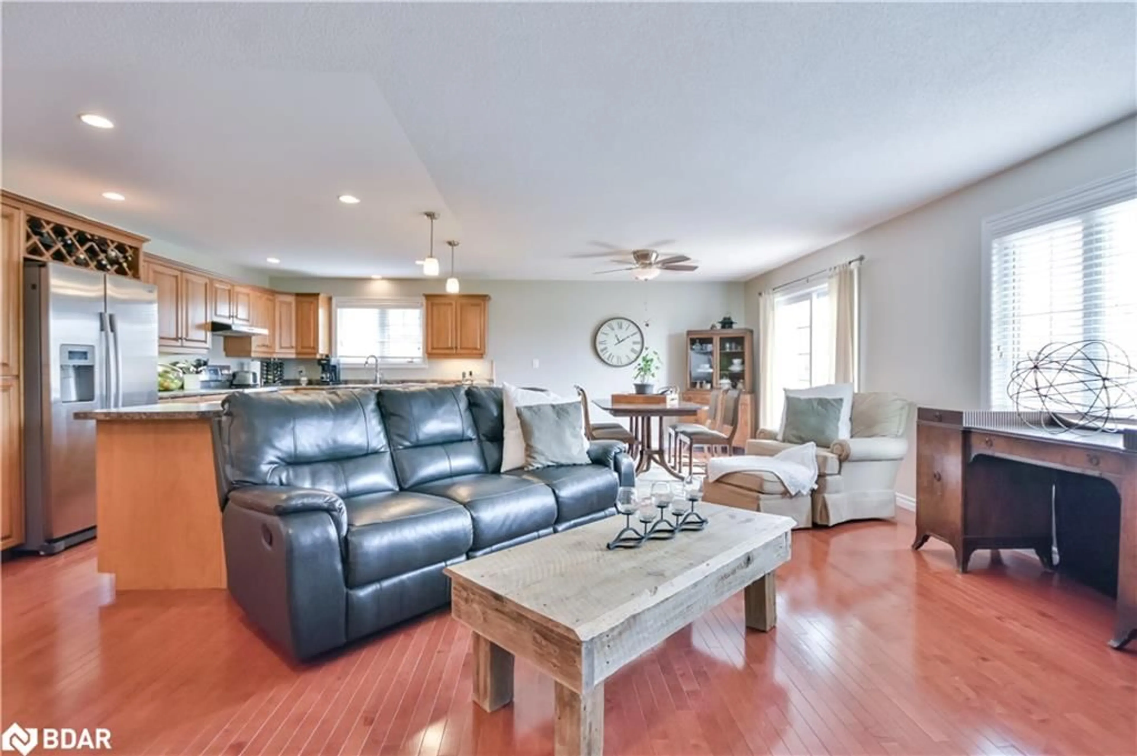 Living room with furniture, wood/laminate floor for 44 Graham St, Elmvale Ontario L0L 1P0