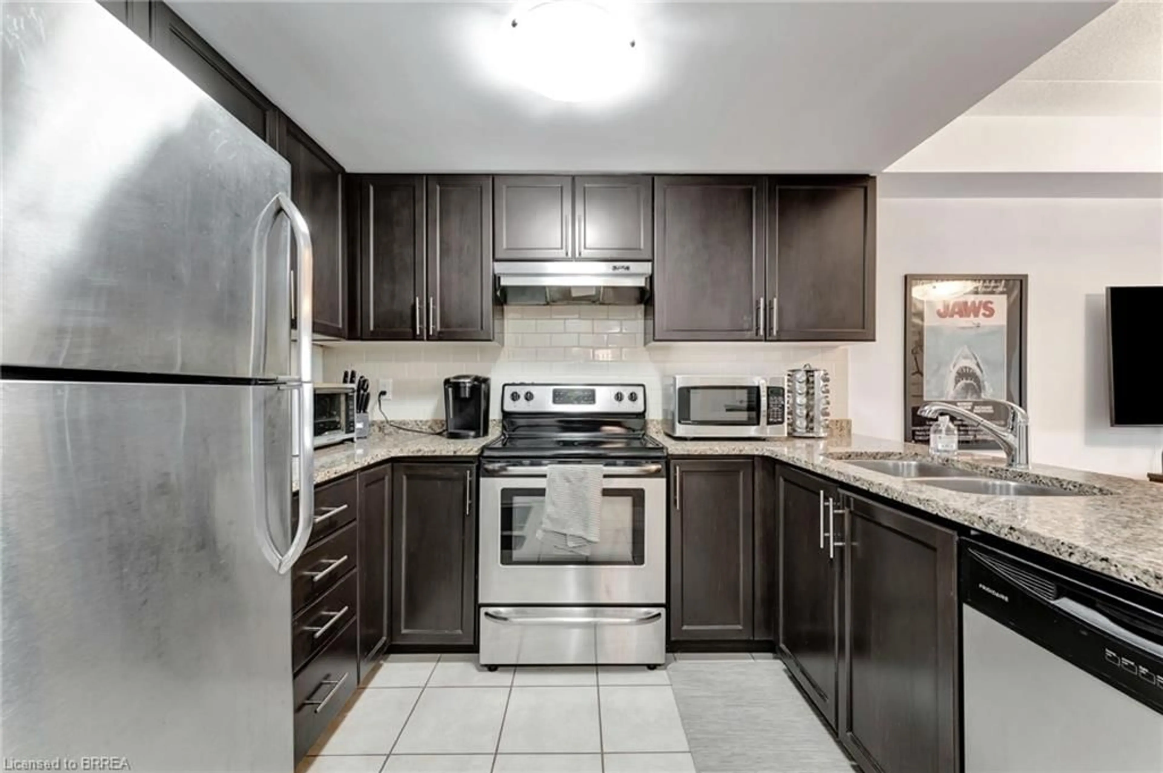 Standard kitchen, ceramic/tile floor for 45 Kingsbury Sq #213, Guelph Ontario N1L 0L2