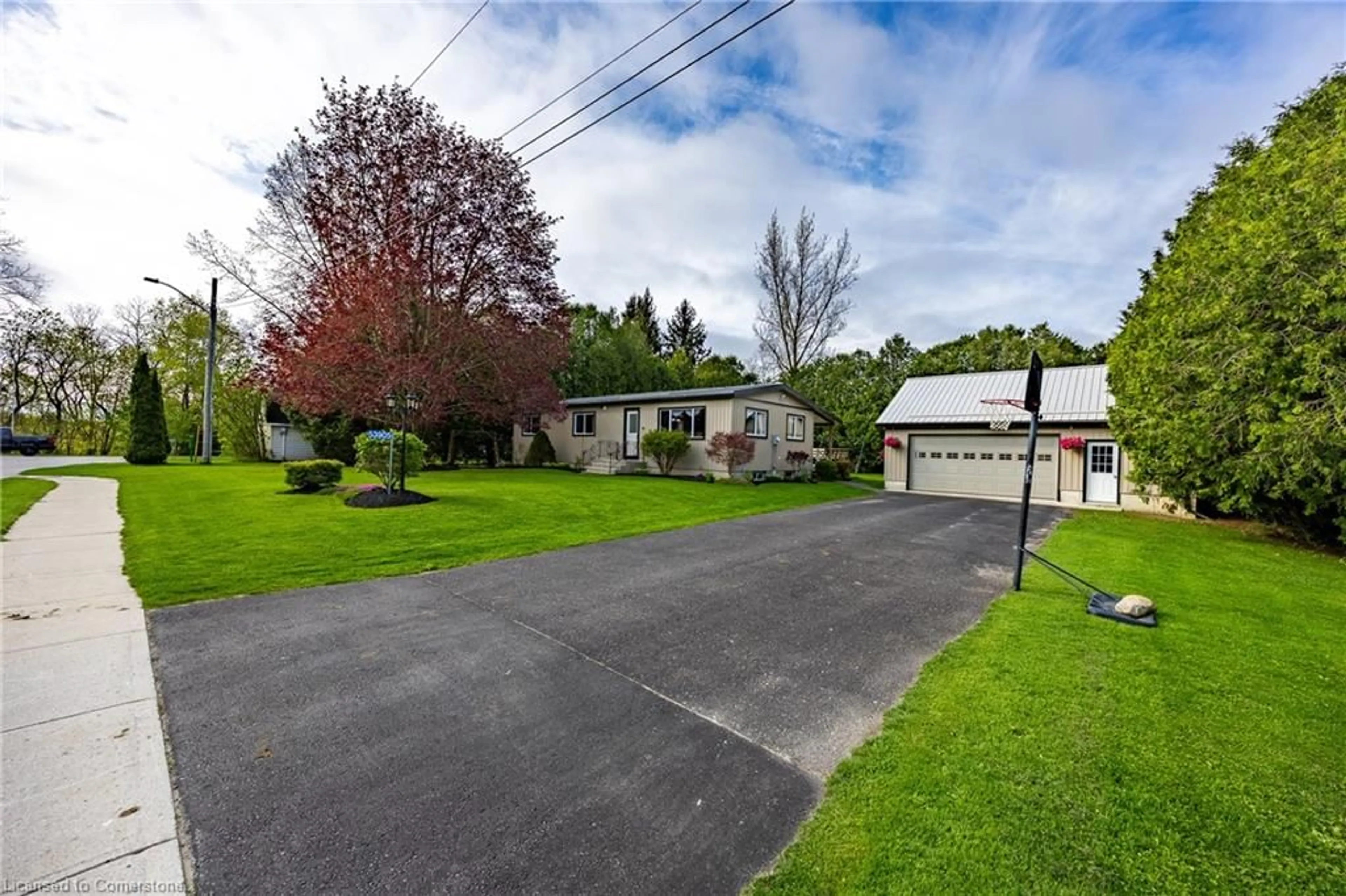 A pic from outside/outdoor area/front of a property/back of a property/a pic from drone, street for 53905 John St, Richmond Ontario N5H 2R1