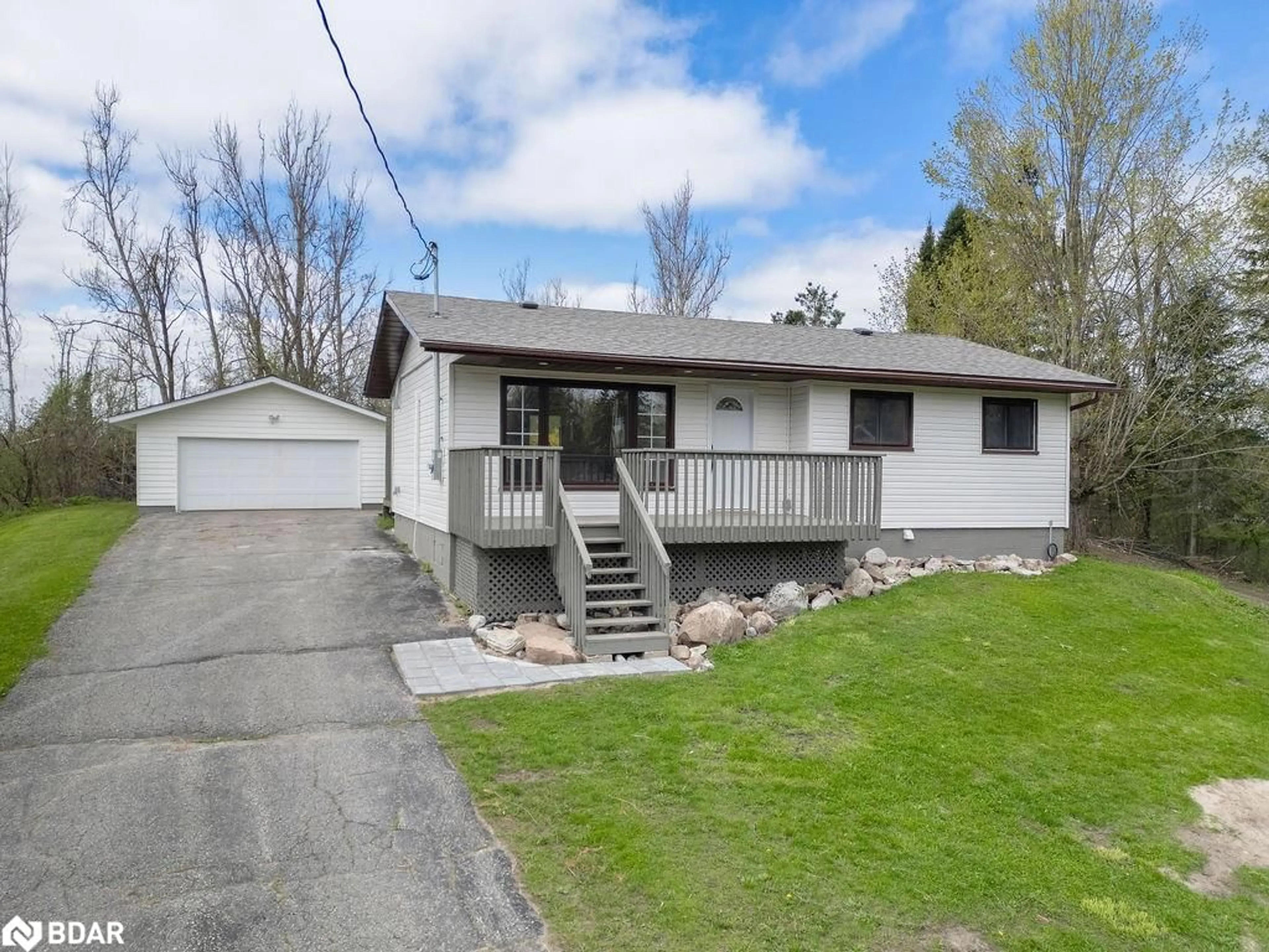 Home with vinyl exterior material, street for 10 Cedar Cres, Trent Lakes Ontario K0M 1A0