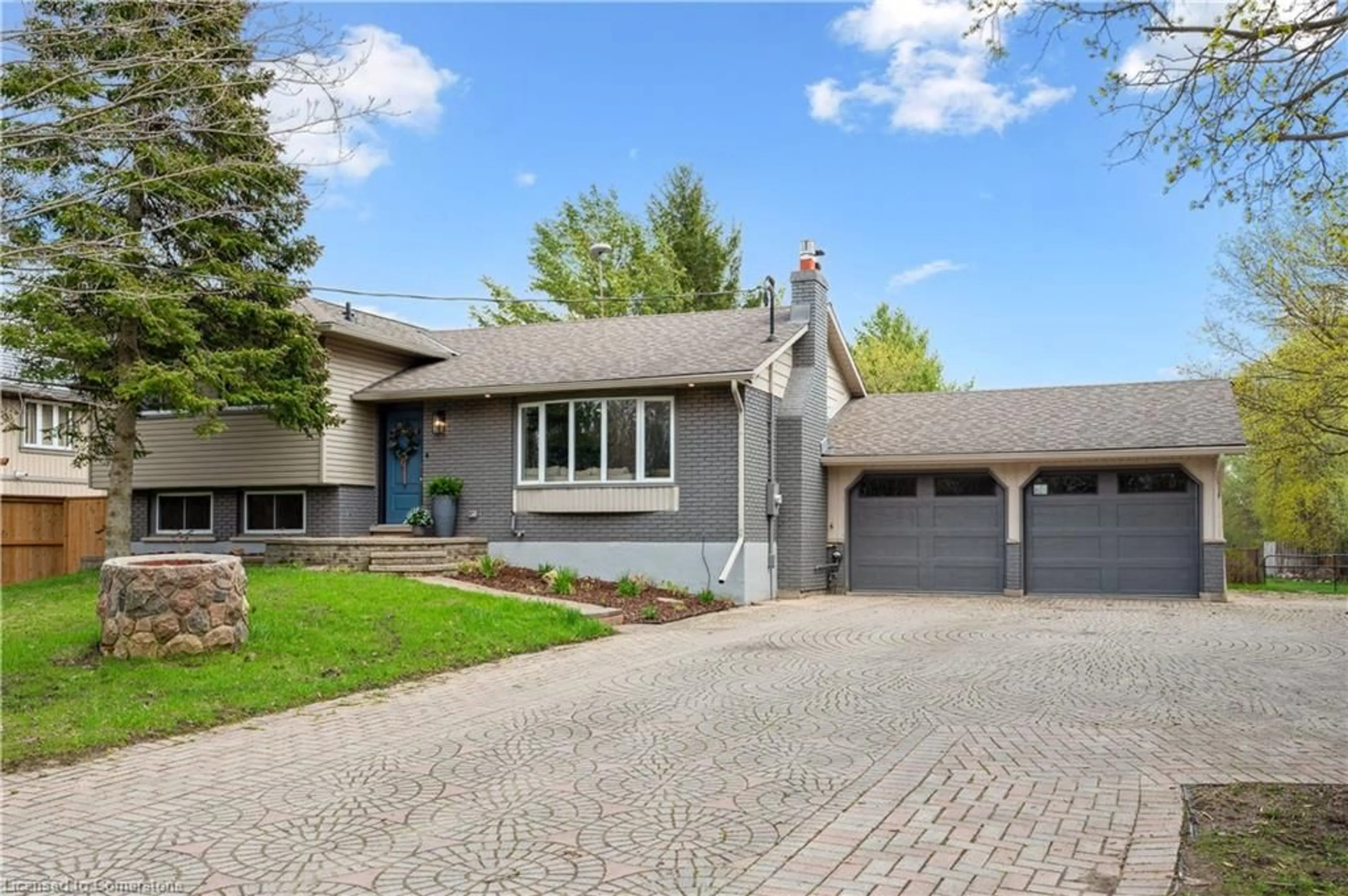 Home with brick exterior material, street for 7481 Eighth Line, Guelph Ontario N1H 6J2