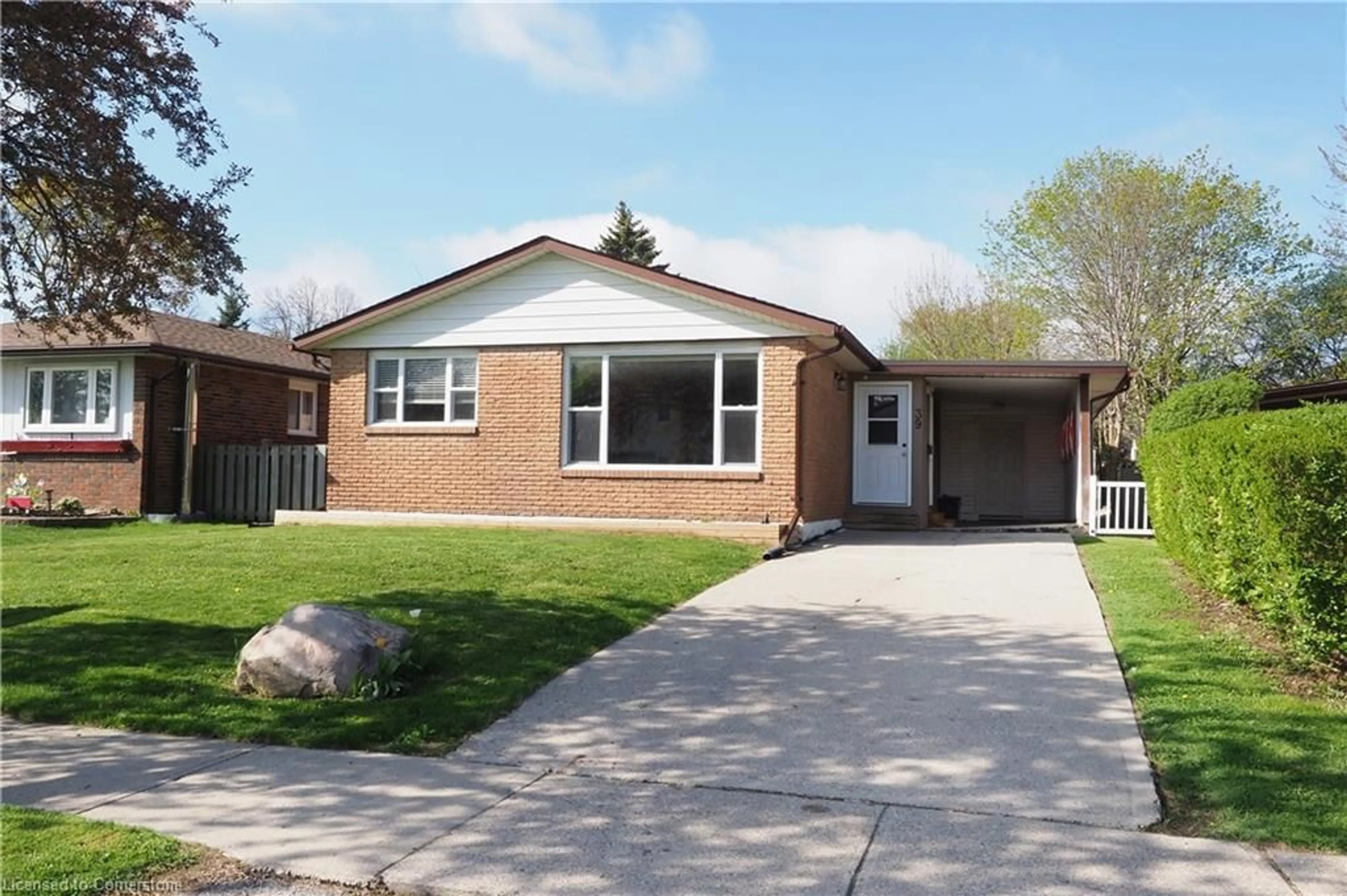 Home with brick exterior material, street for 39 Markwood Dr, Kitchener Ontario N2M 2H3