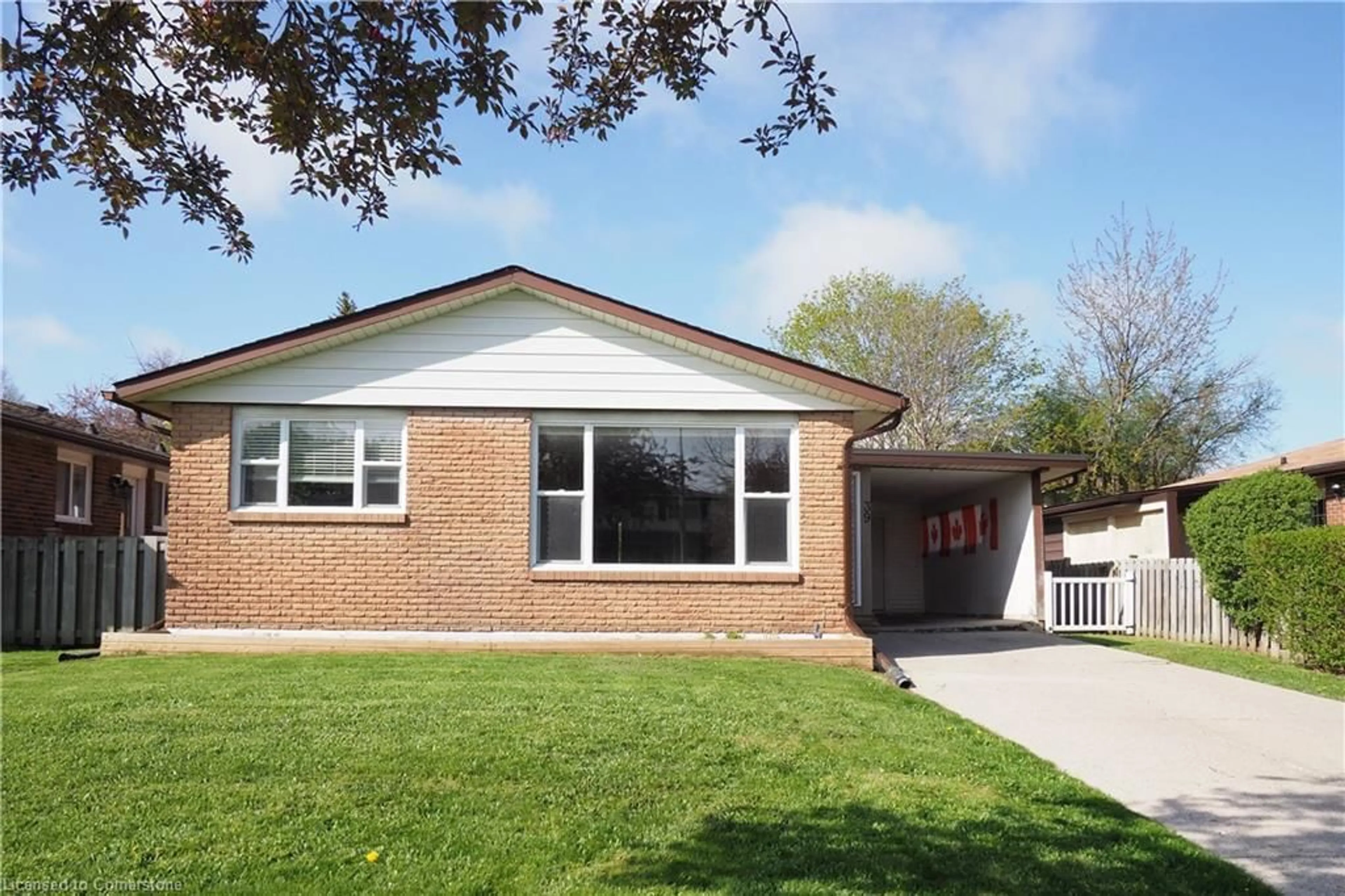 Home with brick exterior material, street for 39 Markwood Dr, Kitchener Ontario N2M 2H3
